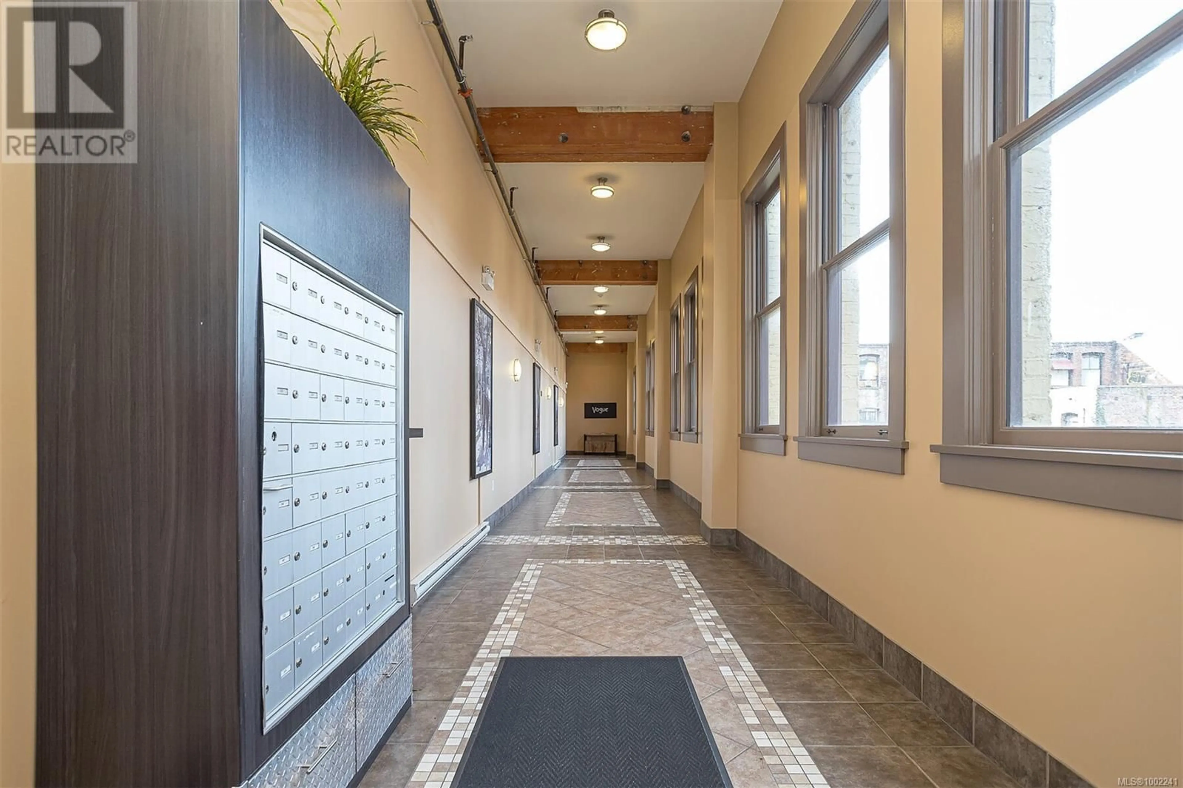 Indoor foyer for 213 - 599 PANDORA AVENUE, Victoria British Columbia V8W1N5