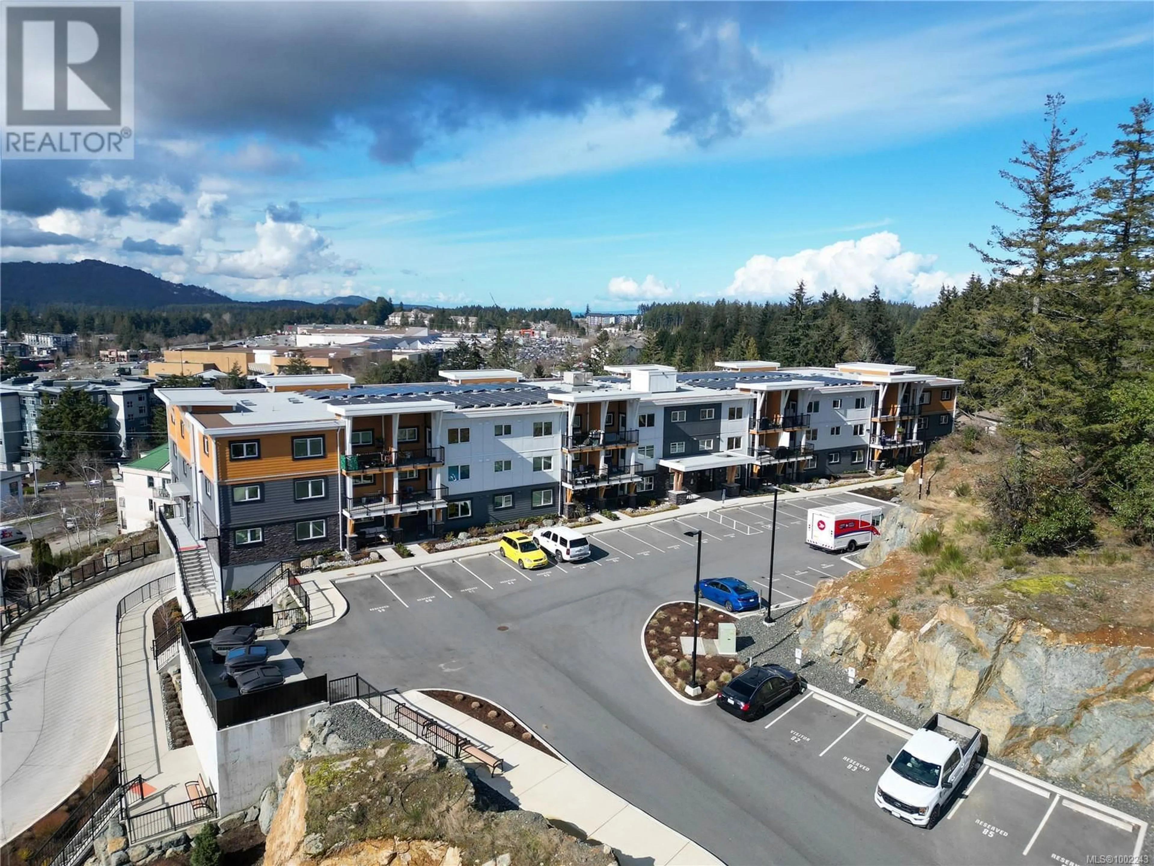 A pic from outside/outdoor area/front of a property/back of a property/a pic from drone, mountain view for 301 - 4810 CEDAR RIDGE PLACE, Nanaimo British Columbia V9T0M7