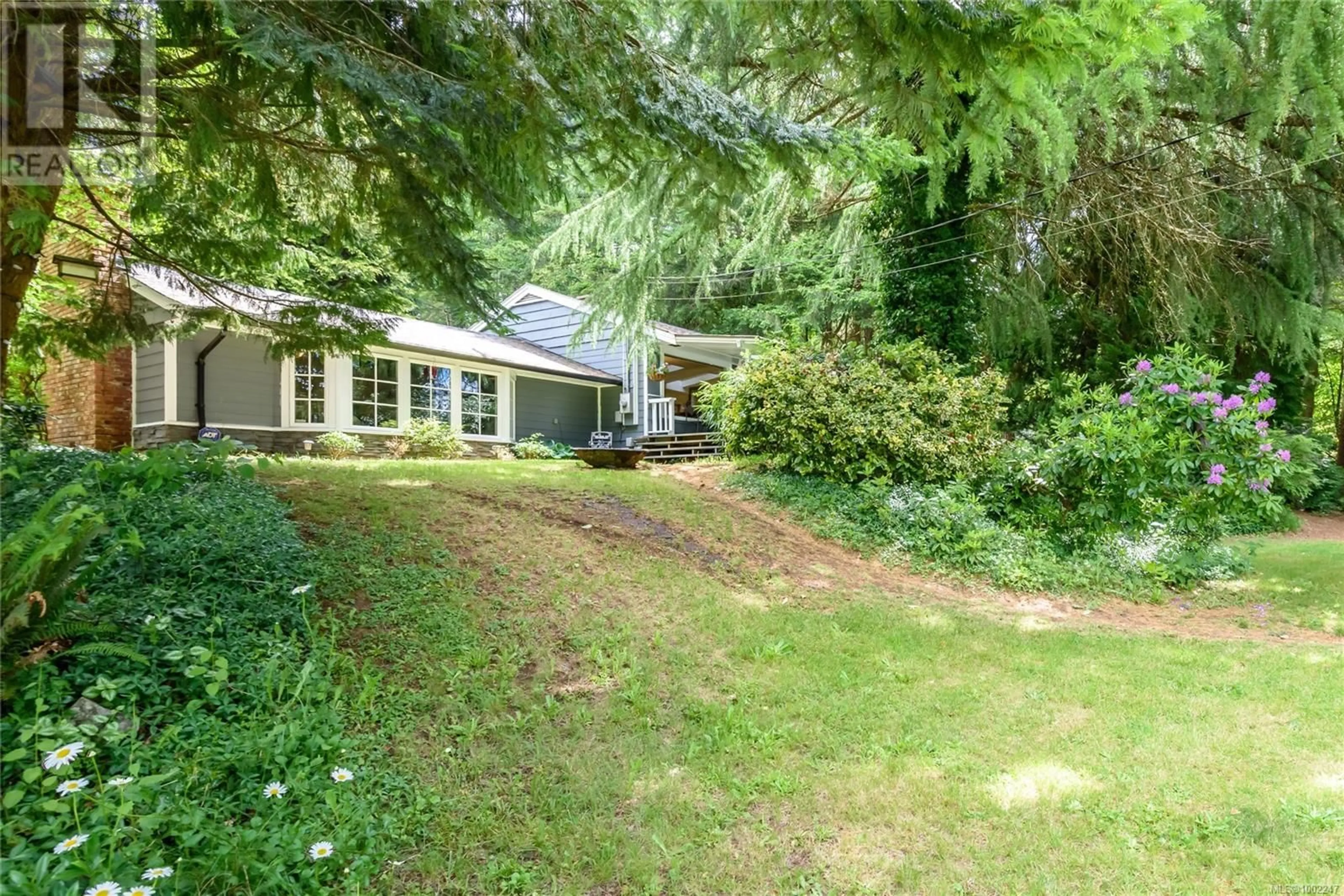 A pic from outside/outdoor area/front of a property/back of a property/a pic from drone, forest/trees view for 2840 BACK ROAD, Courtenay British Columbia V9N9G9