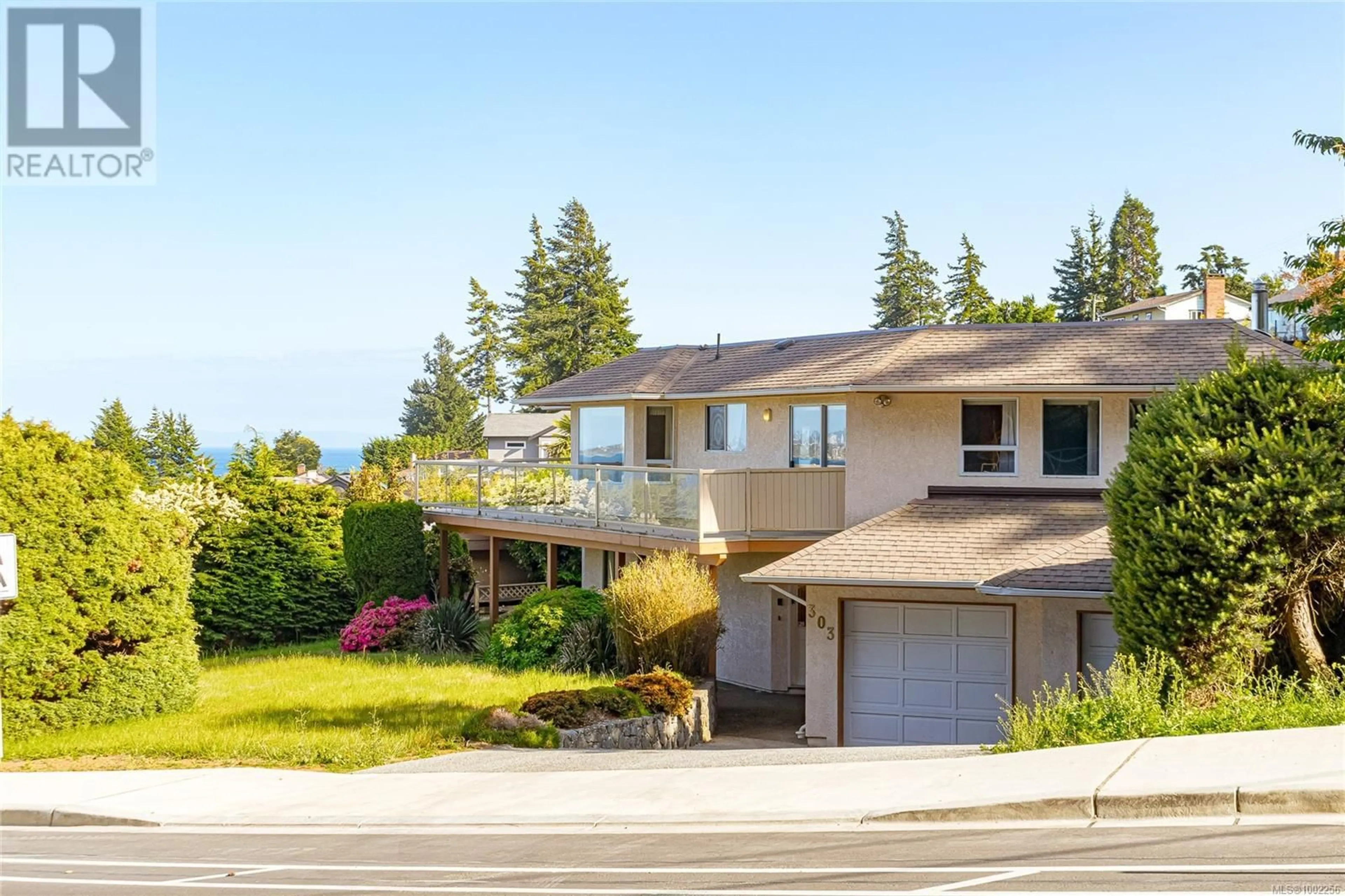 A pic from outside/outdoor area/front of a property/back of a property/a pic from drone, water/lake/river/ocean view for 303 LAGOON ROAD, Colwood British Columbia V9C3T3