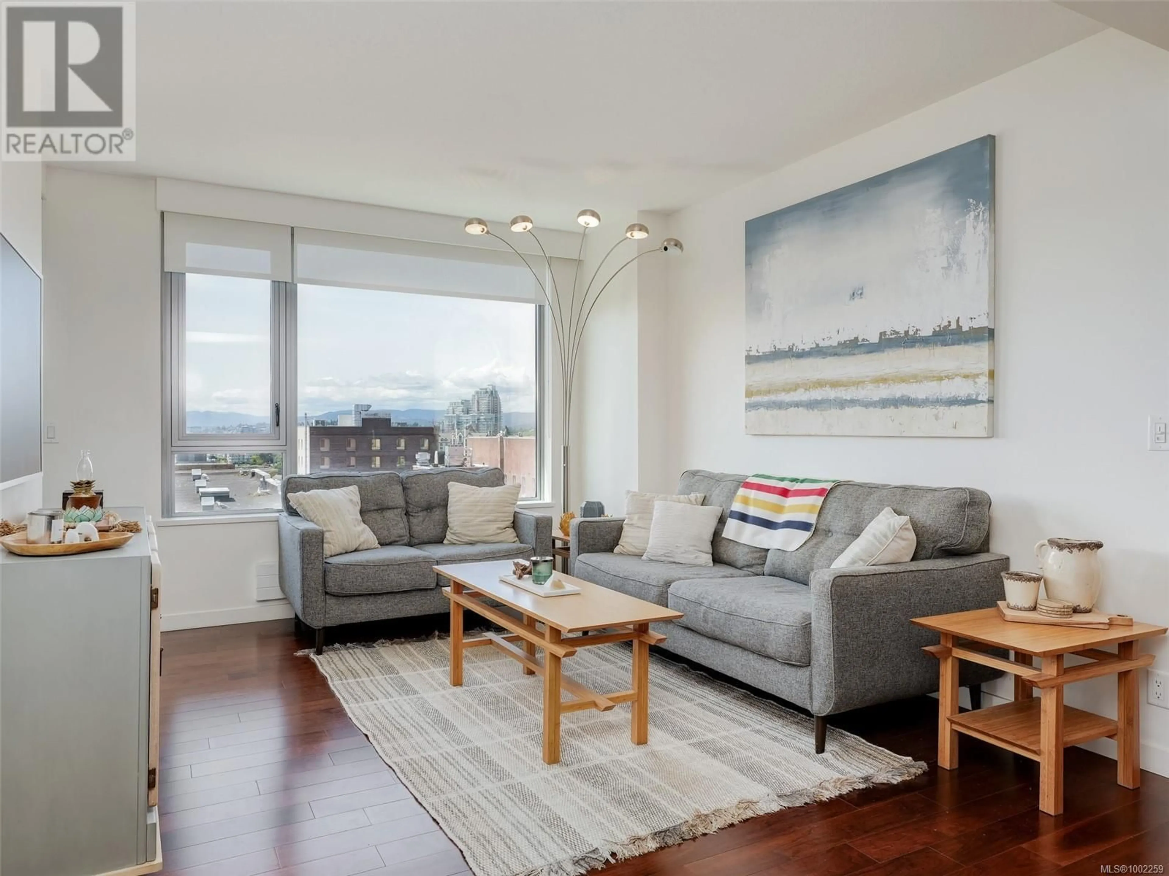 Living room with furniture, wood/laminate floor for 603 - 608 BROUGHTON STREET, Victoria British Columbia V8W1C7