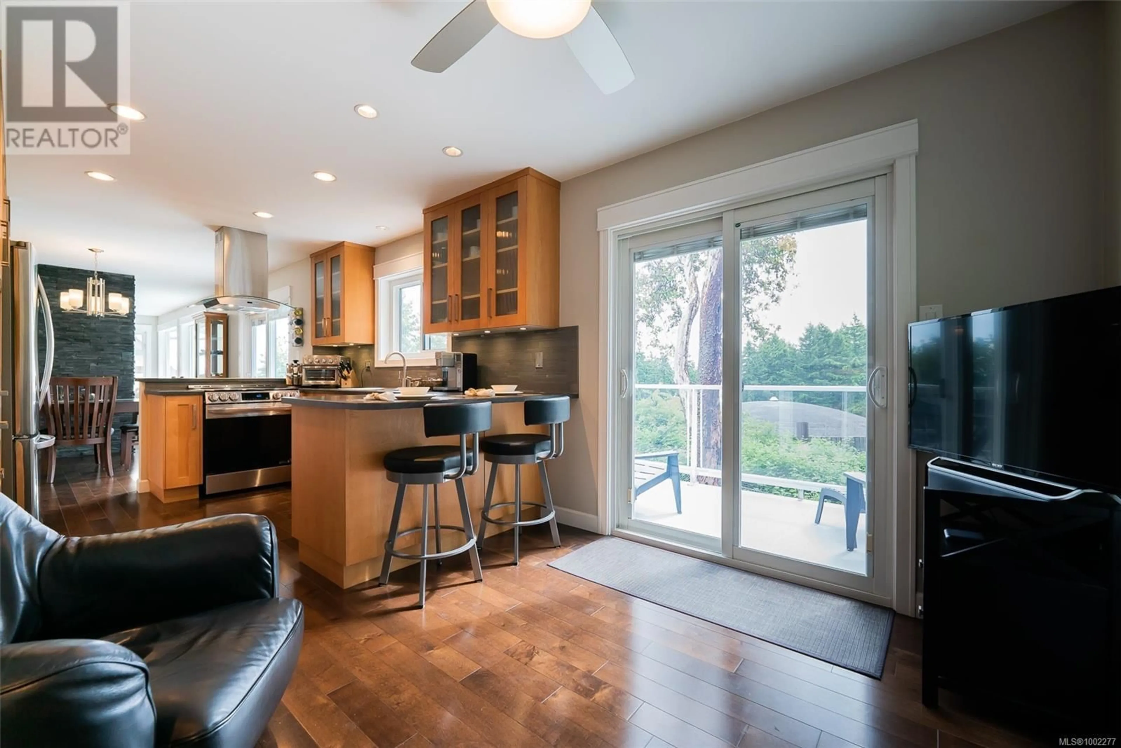 Open concept kitchen, wood/laminate floor for 388 TRINITY DRIVE, Nanaimo British Columbia V9R5X3