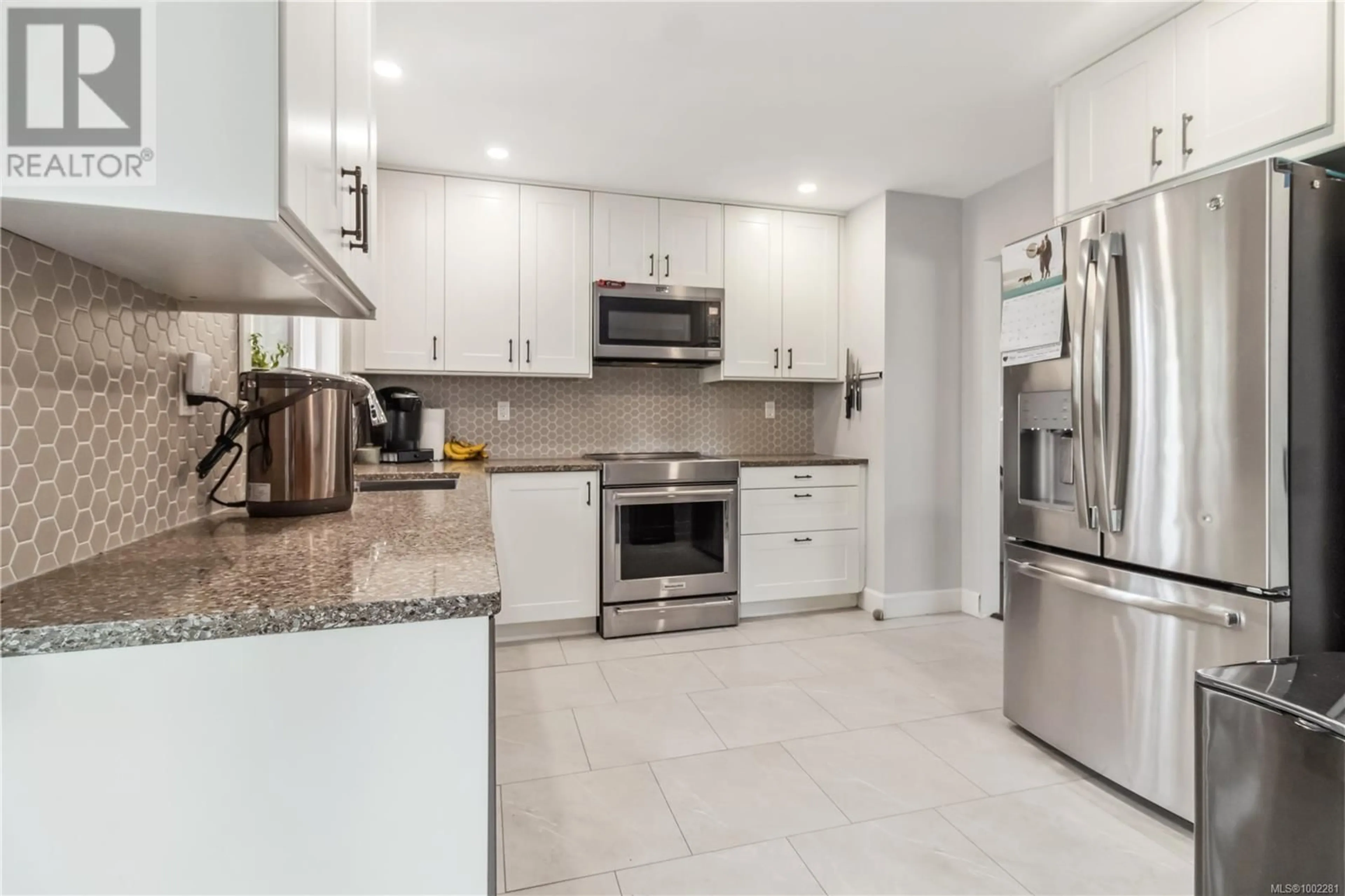 Open concept kitchen, ceramic/tile floor for 10343 PATRICIA PLACE, Sidney British Columbia V8L3J5