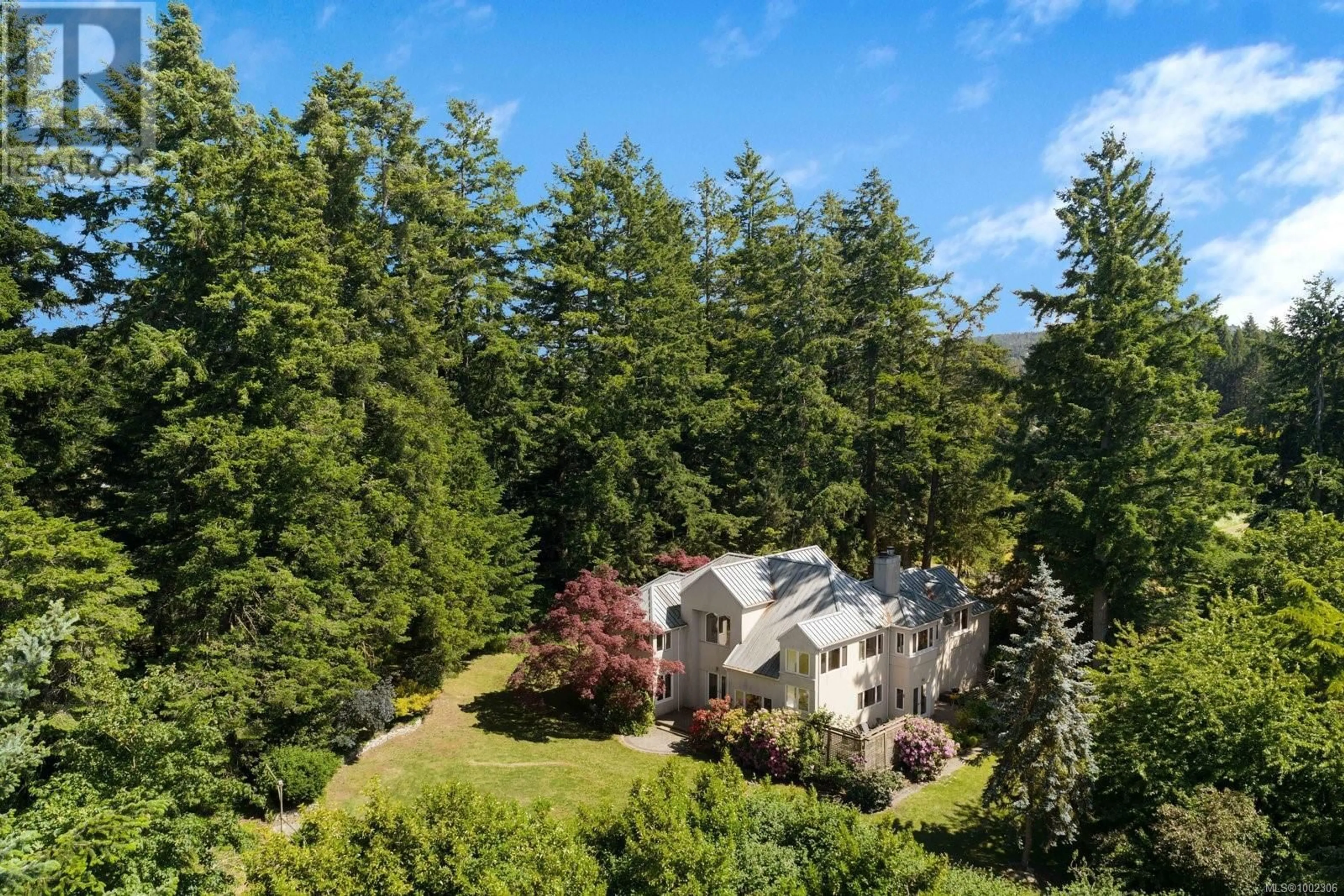 A pic from outside/outdoor area/front of a property/back of a property/a pic from drone, forest/trees view for 1922 MEADOWBANK ROAD, Central Saanich British Columbia V8M1X9