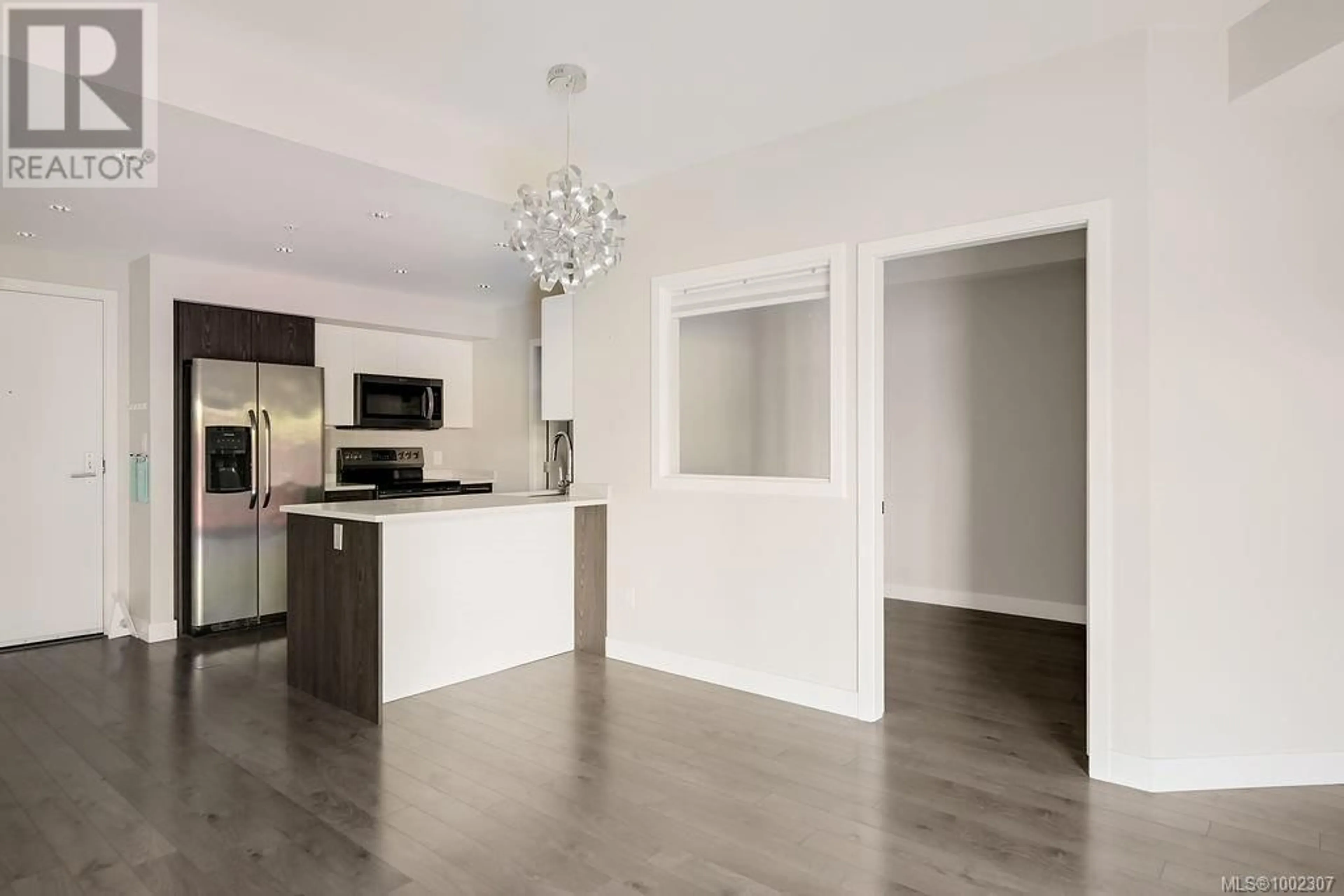 Open concept kitchen, unknown for 203 - 1000 INVERNESS ROAD, Saanich British Columbia V8X2S1