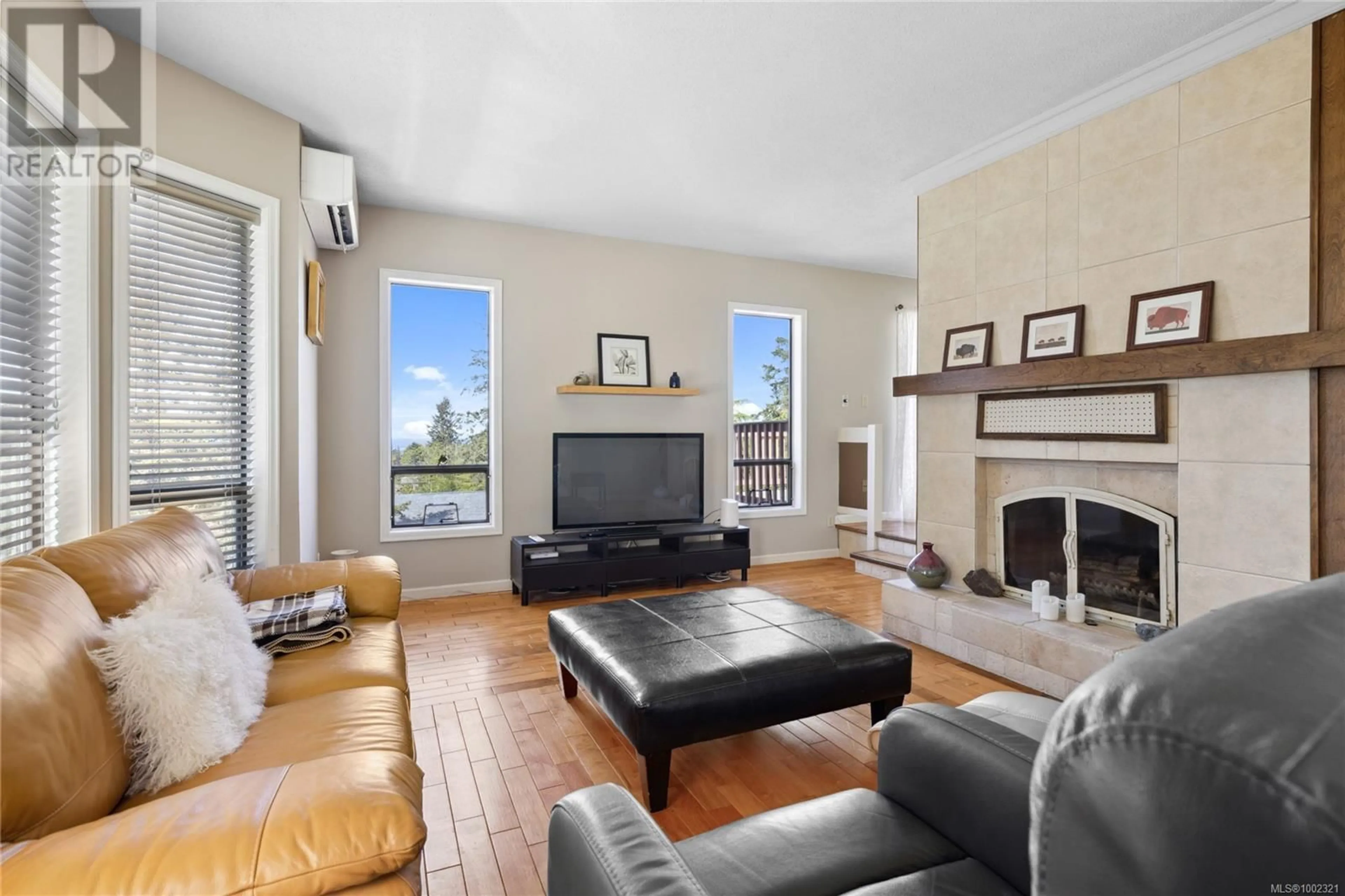 Living room with furniture, unknown for 7496 CLARK CRESCENT, Lantzville British Columbia V0R2H0
