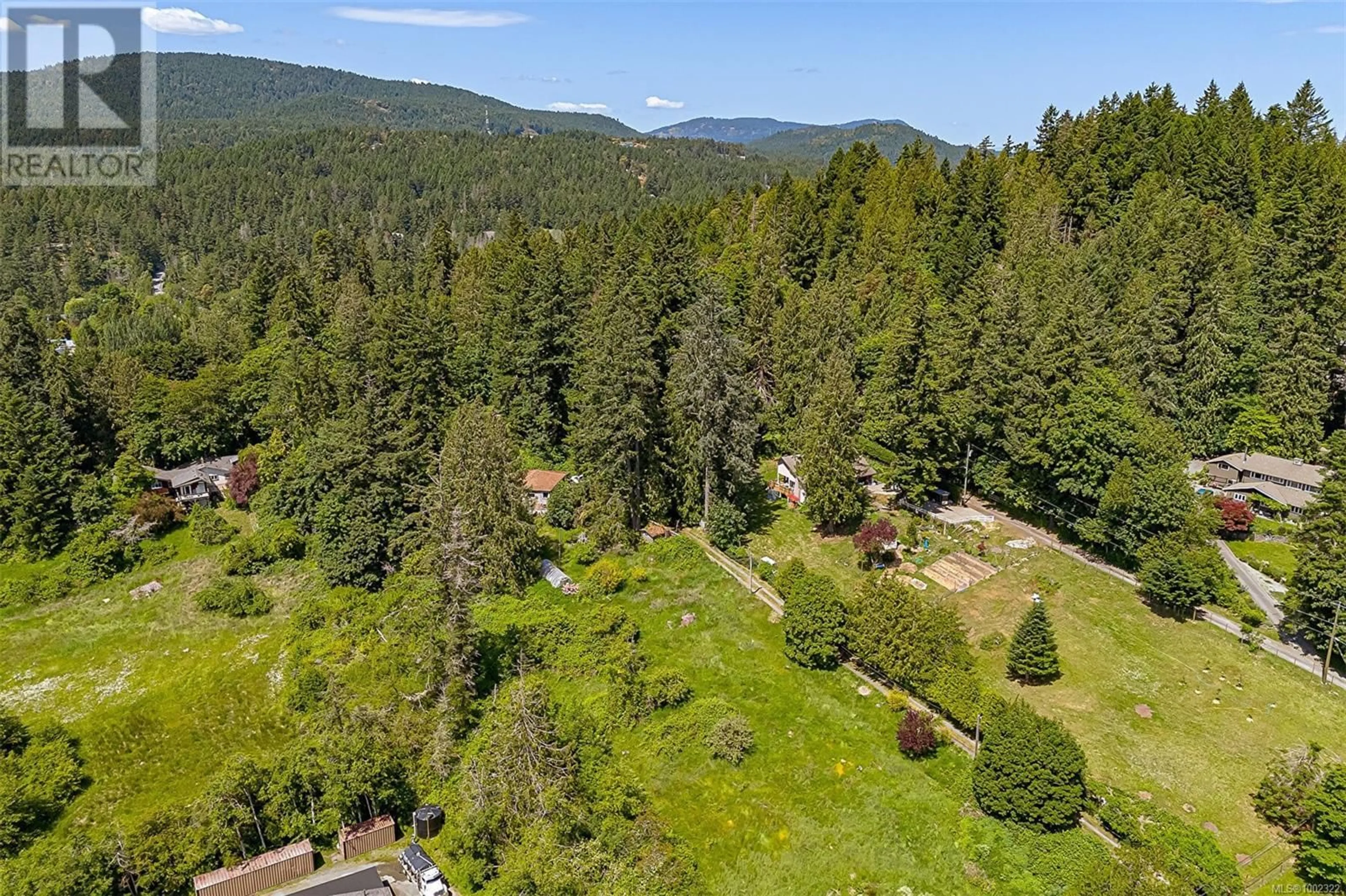 A pic from outside/outdoor area/front of a property/back of a property/a pic from drone, forest/trees view for 5368 SPARTON ROAD, Saanich British Columbia V9E2H5