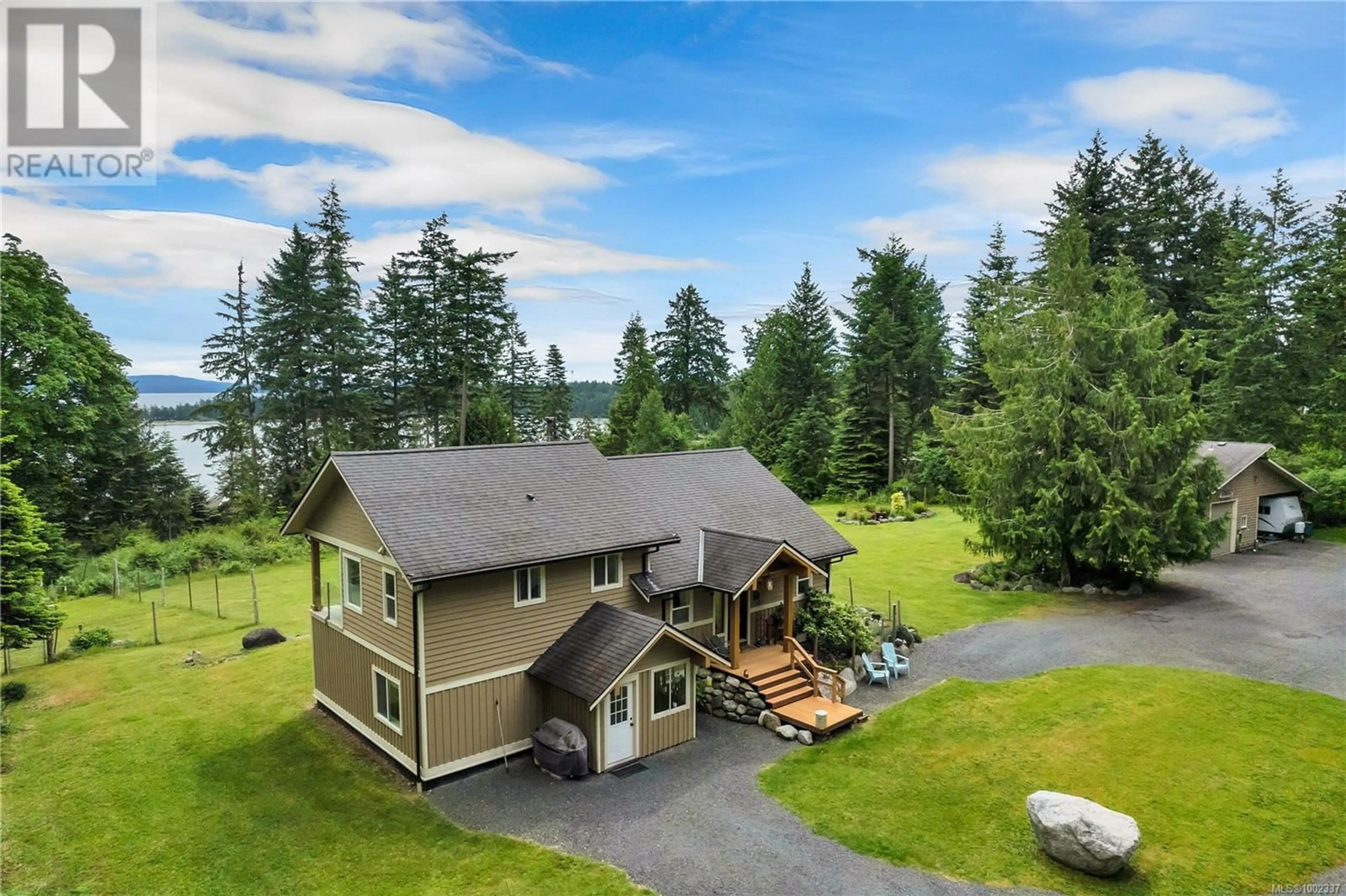 A pic from outside/outdoor area/front of a property/back of a property/a pic from drone, water/lake/river/ocean view for 620 VALPY ROAD, Quadra Island British Columbia V0P1H0