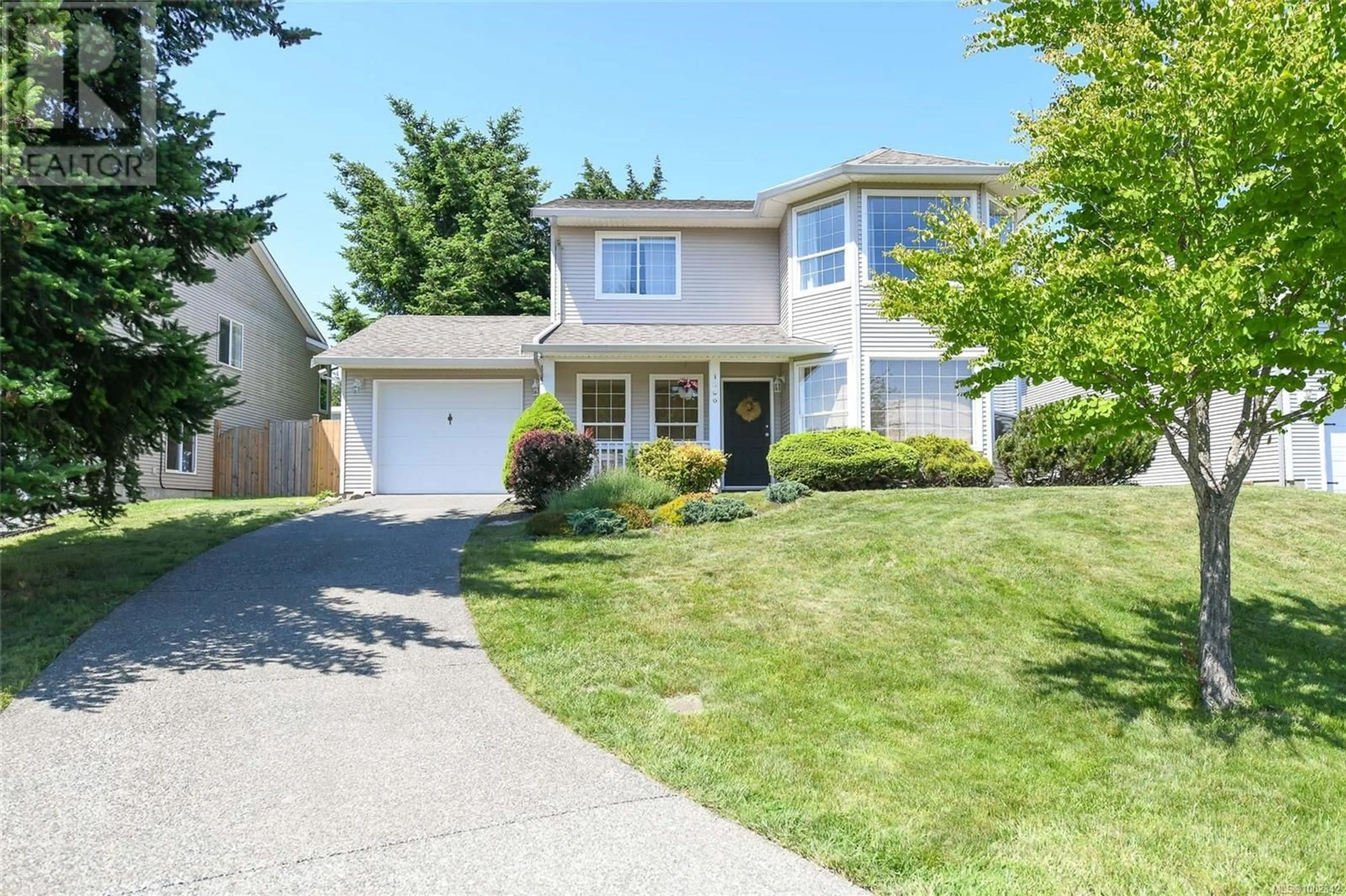 Home with vinyl exterior material, street for 1296 BECKTON DRIVE, Comox British Columbia V9M4G9