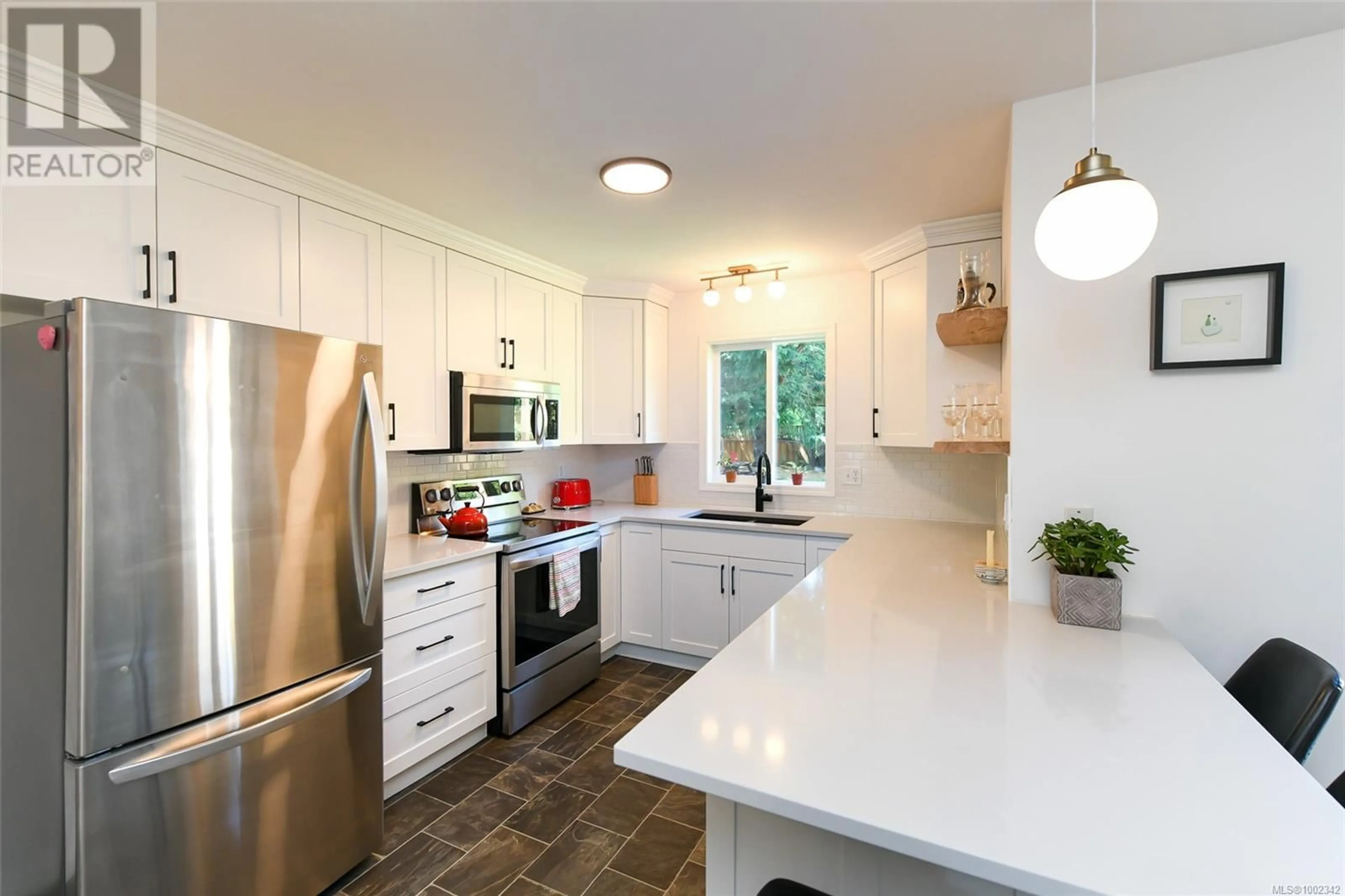 Open concept kitchen, ceramic/tile floor for 1296 BECKTON DRIVE, Comox British Columbia V9M4G9
