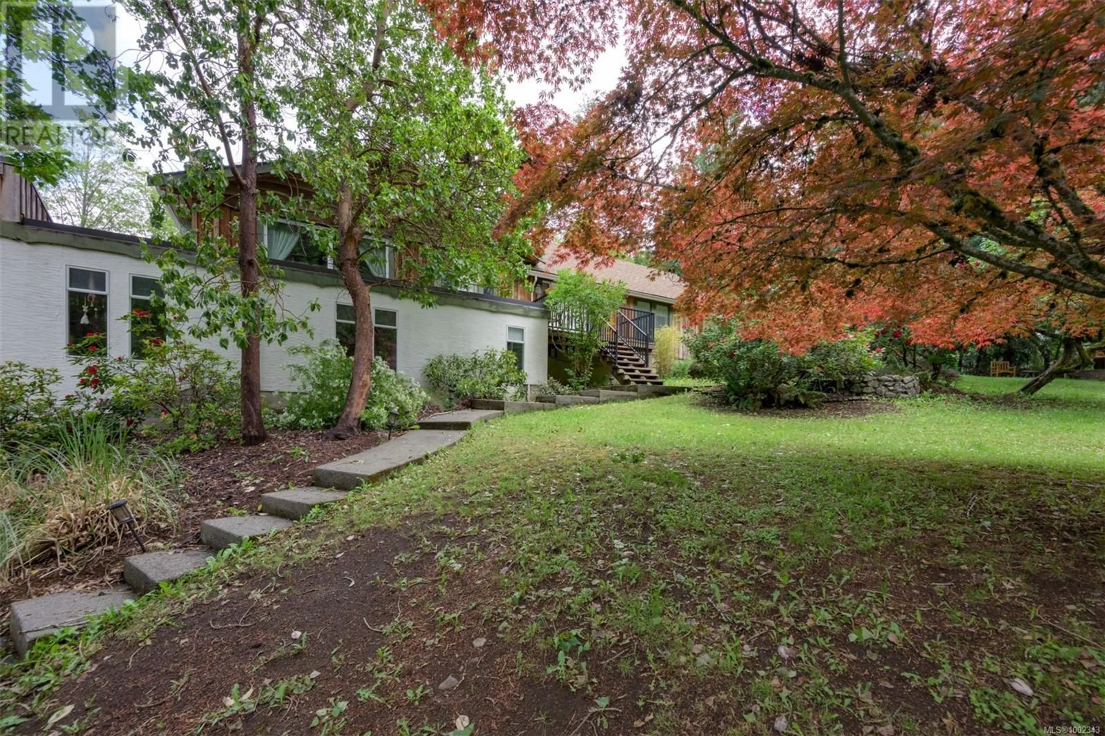 A pic from outside/outdoor area/front of a property/back of a property/a pic from drone, street for 734 LATORIA ROAD, Langford British Columbia V9C3A4