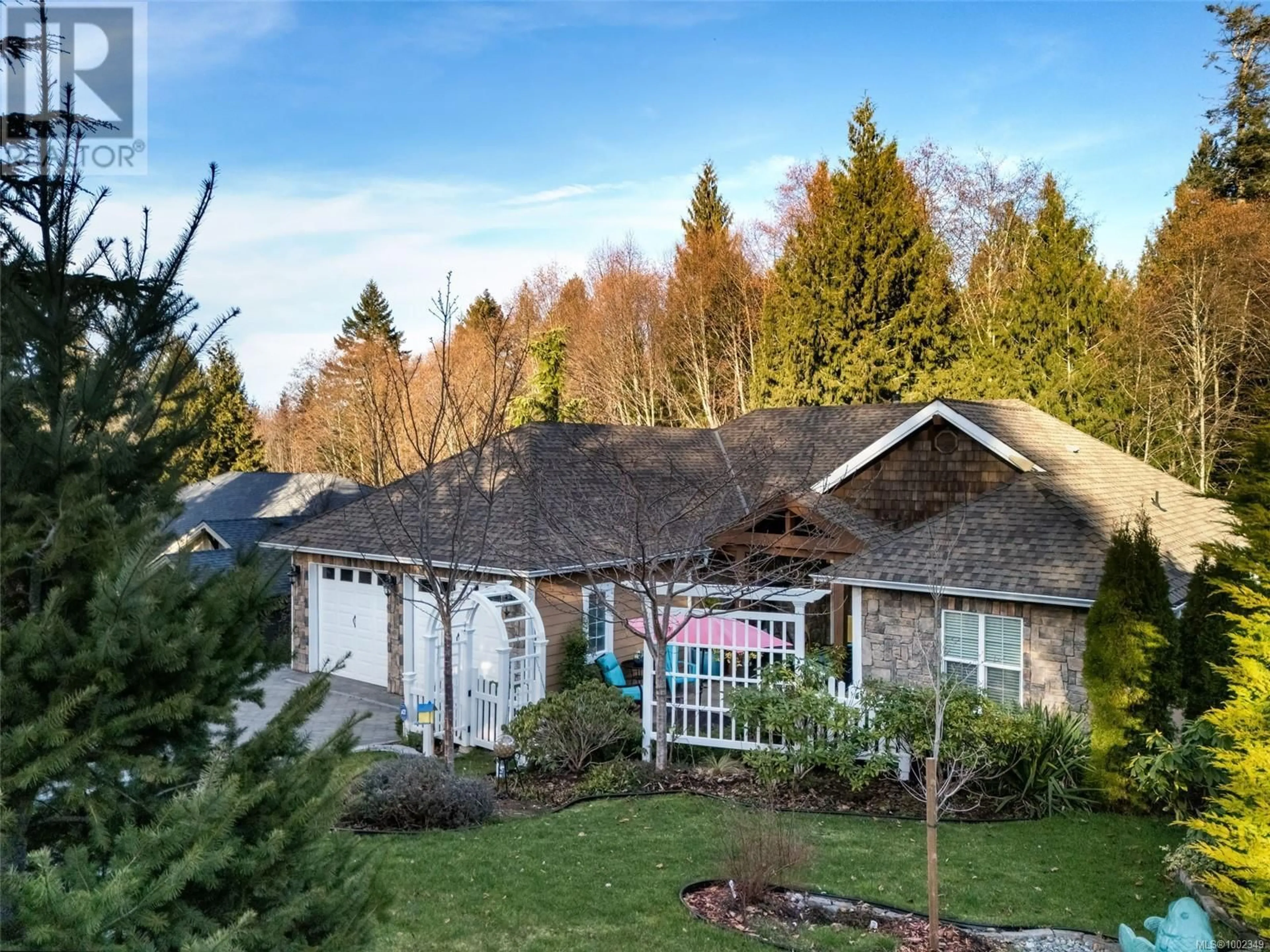 A pic from outside/outdoor area/front of a property/back of a property/a pic from drone, mountain view for 2510 KINNOULL CRESCENT, Mill Bay British Columbia V8H1H3