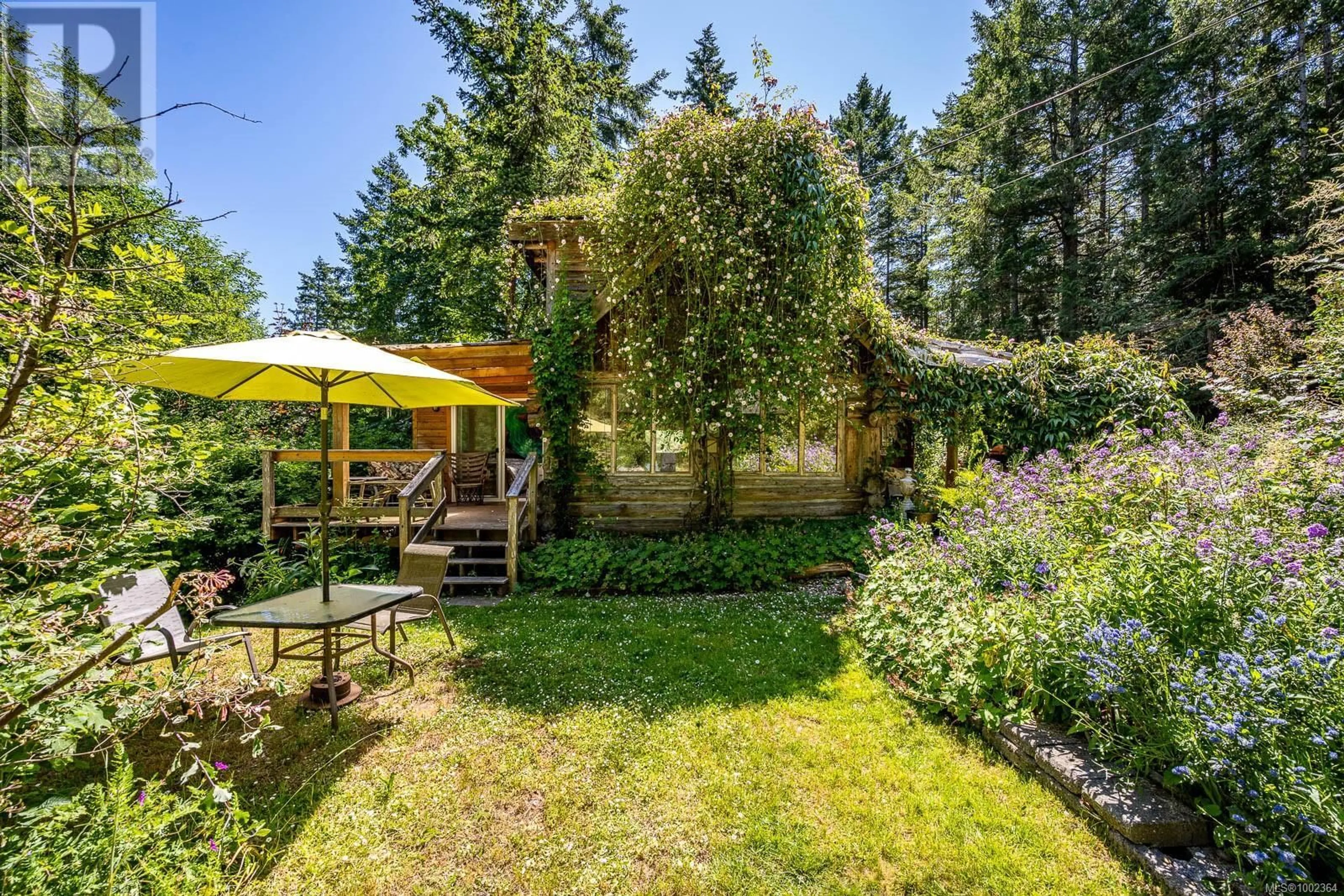 Patio, forest/trees view for 7555 CENTRAL ROAD, Hornby Island British Columbia V0R1Z0