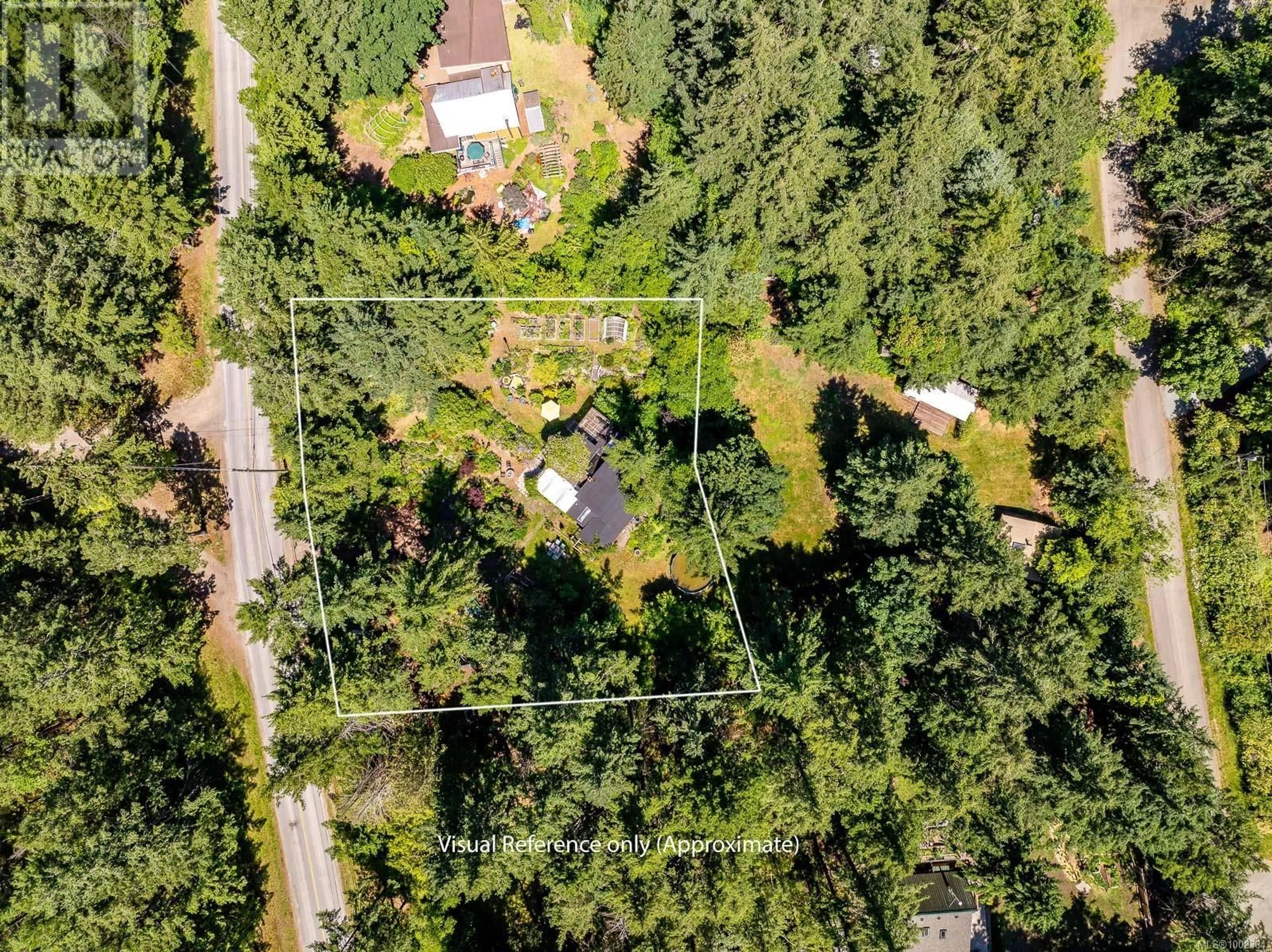 A pic from outside/outdoor area/front of a property/back of a property/a pic from drone, forest/trees view for 7555 CENTRAL ROAD, Hornby Island British Columbia V0R1Z0