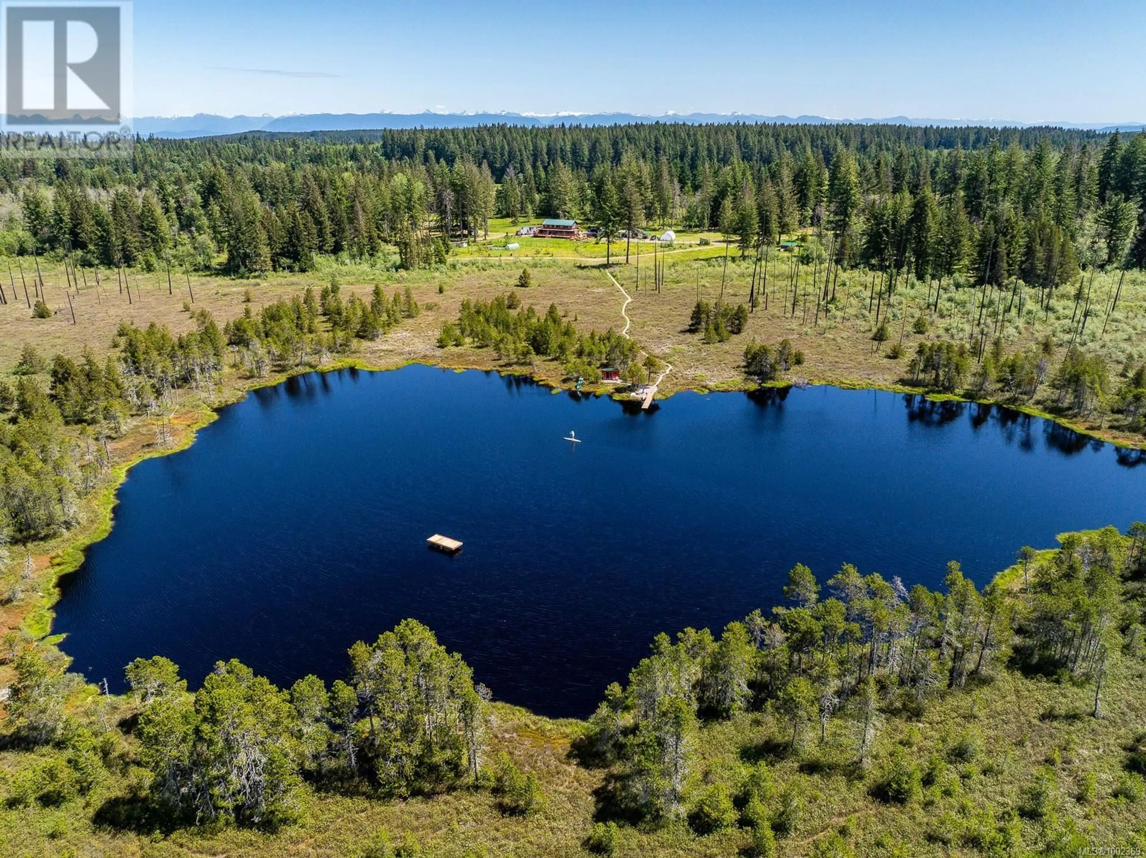 A pic from outside/outdoor area/front of a property/back of a property/a pic from drone, water/lake/river/ocean view for 2030 SPIKE ROAD, Merville British Columbia V9J1N5