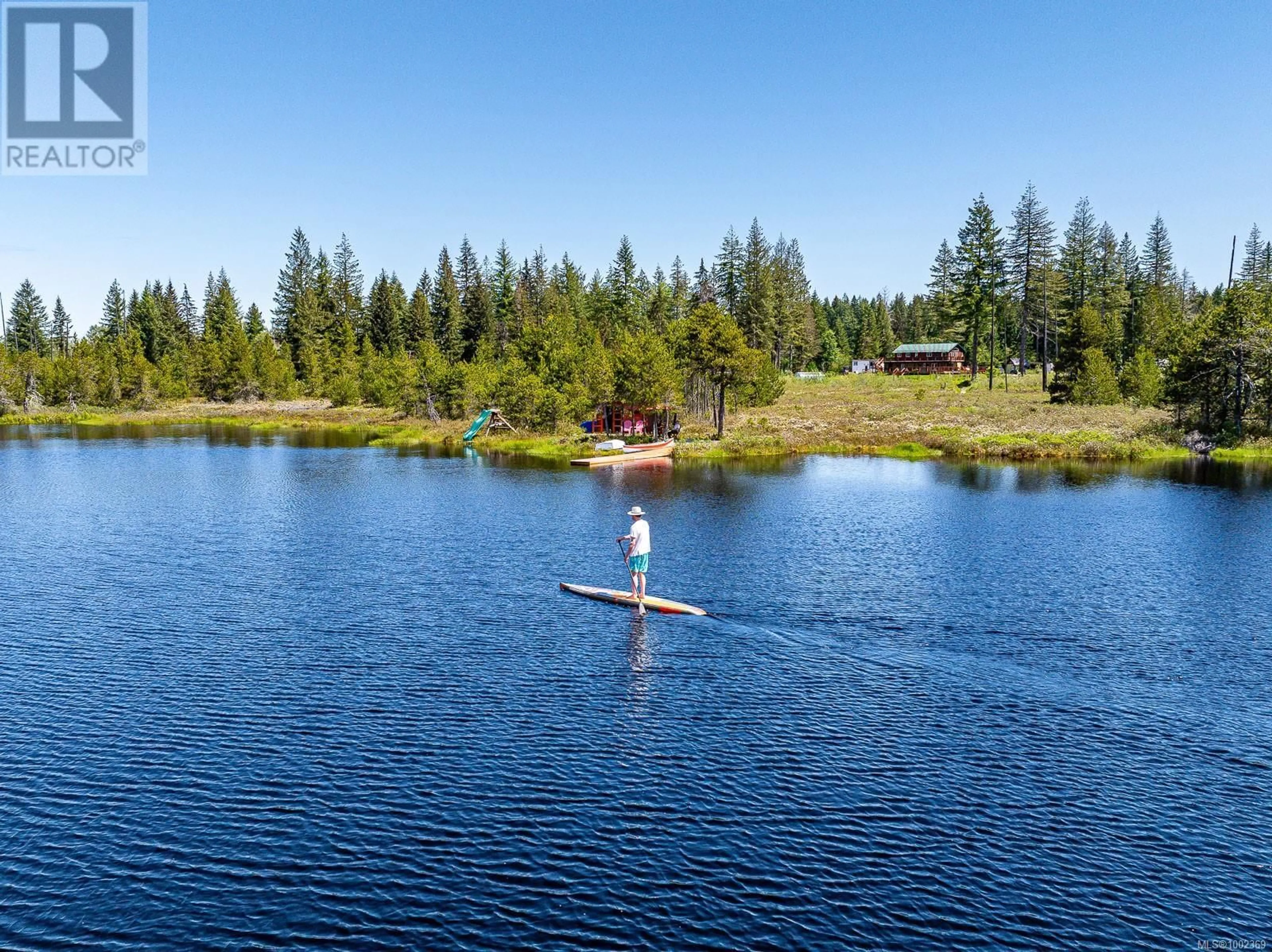 A pic from outside/outdoor area/front of a property/back of a property/a pic from drone, water/lake/river/ocean view for 2030 SPIKE ROAD, Merville British Columbia V9J1N5