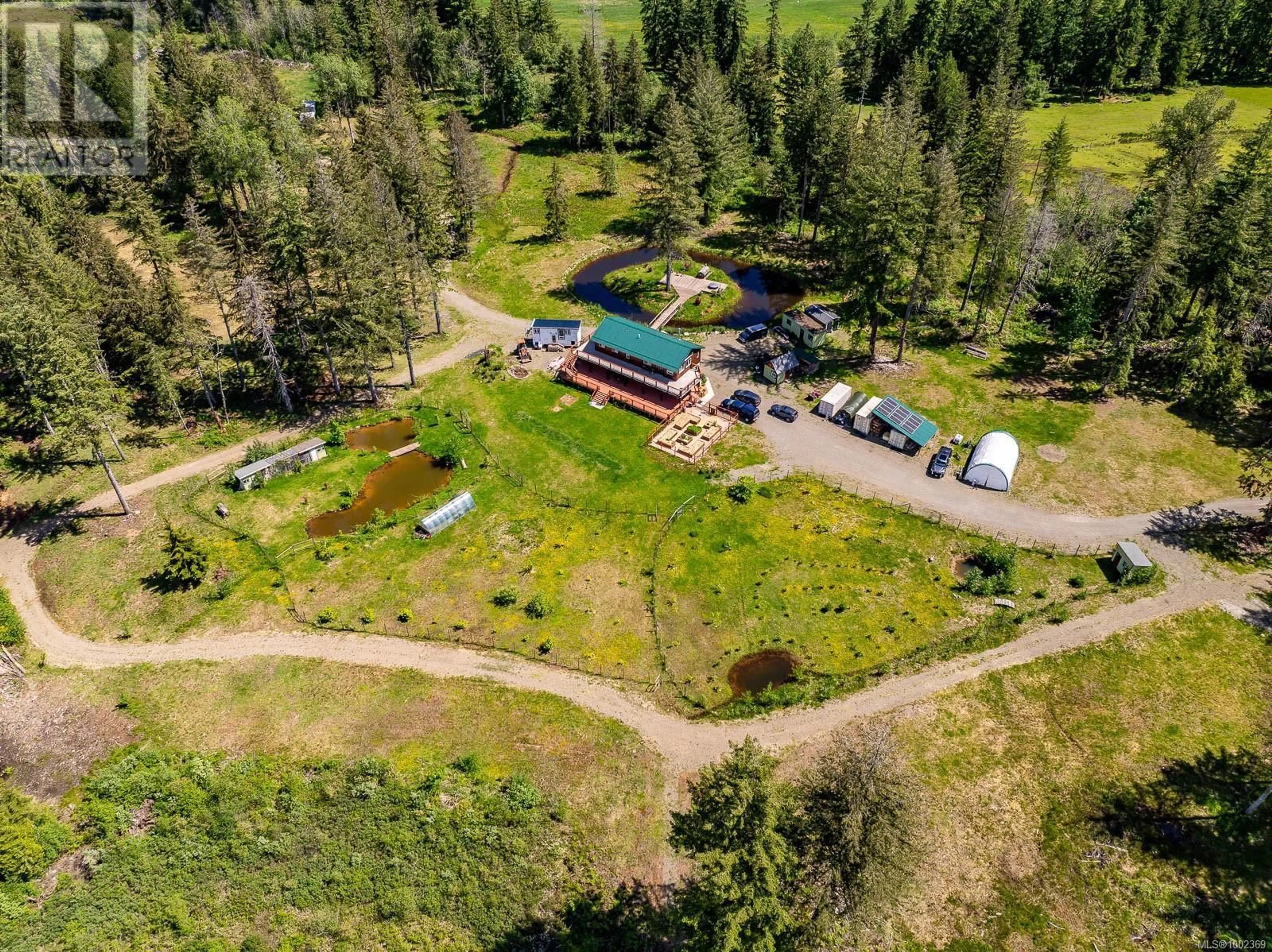 A pic from outside/outdoor area/front of a property/back of a property/a pic from drone, unknown for 2030 SPIKE ROAD, Merville British Columbia V9J1N5