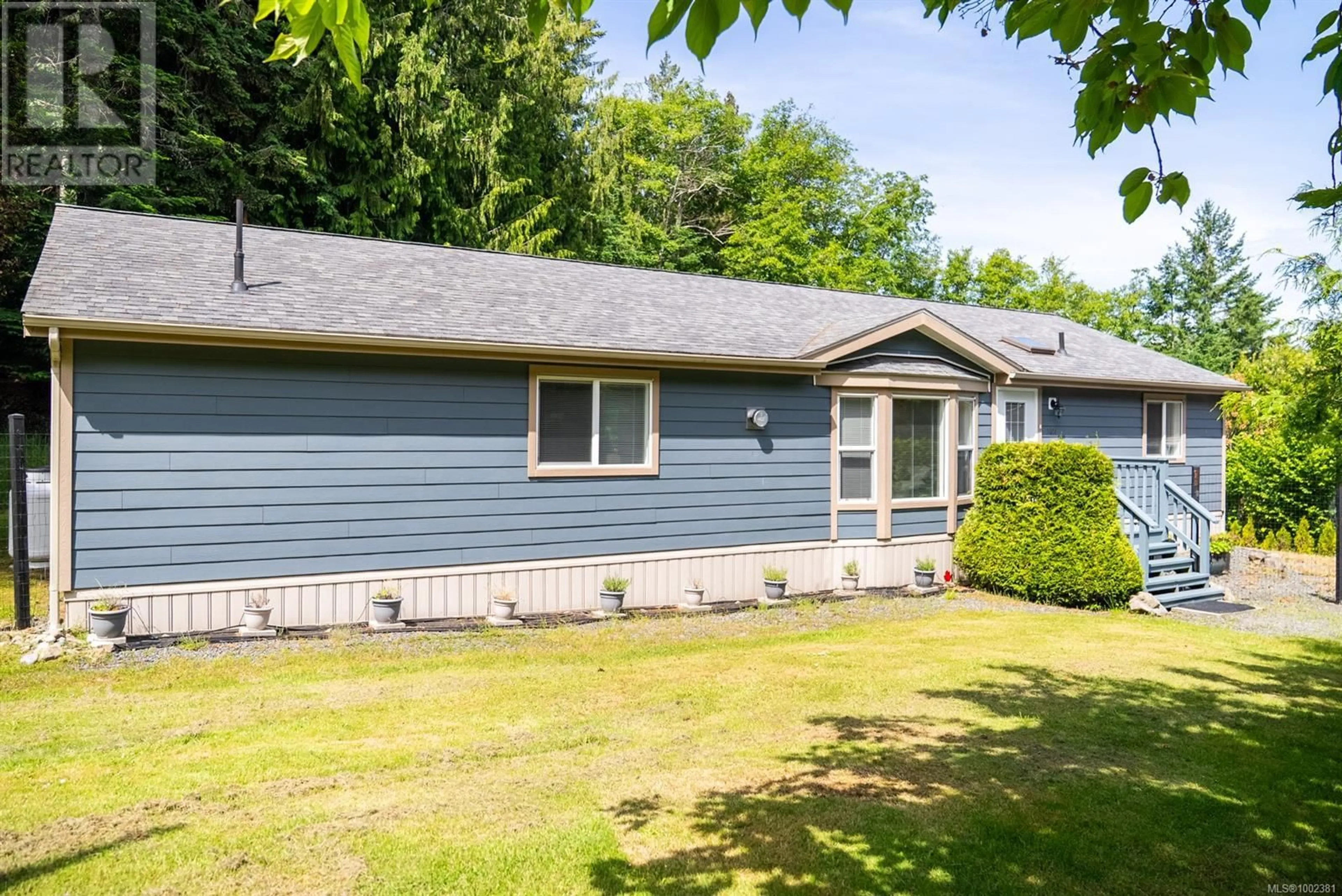Home with vinyl exterior material, street for 2604 DORY WAY, Pender Island British Columbia V0N2M2