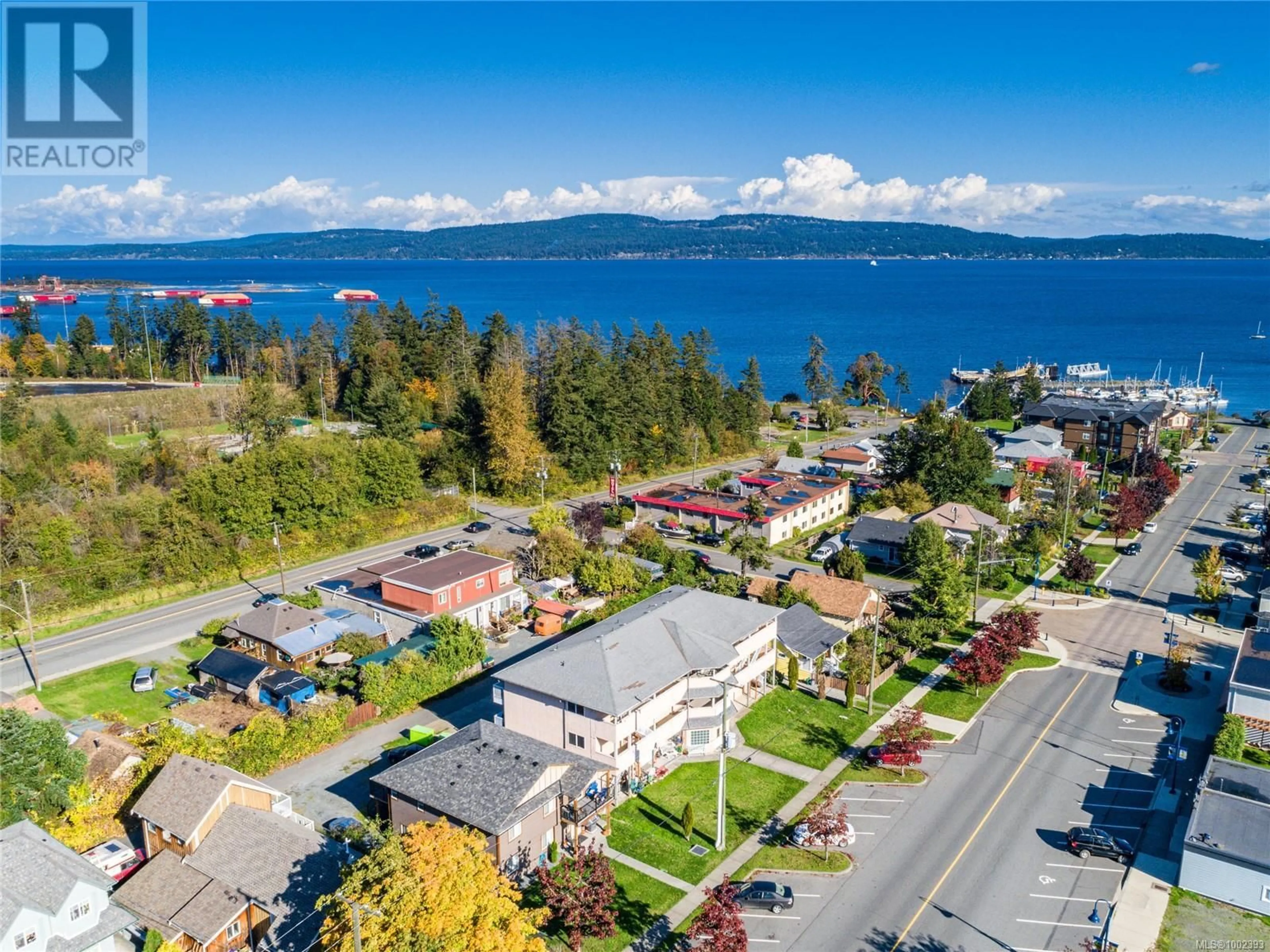 A pic from outside/outdoor area/front of a property/back of a property/a pic from drone, water/lake/river/ocean view for 1 - 1587 JOAN AVENUE, Crofton British Columbia V0R1R0