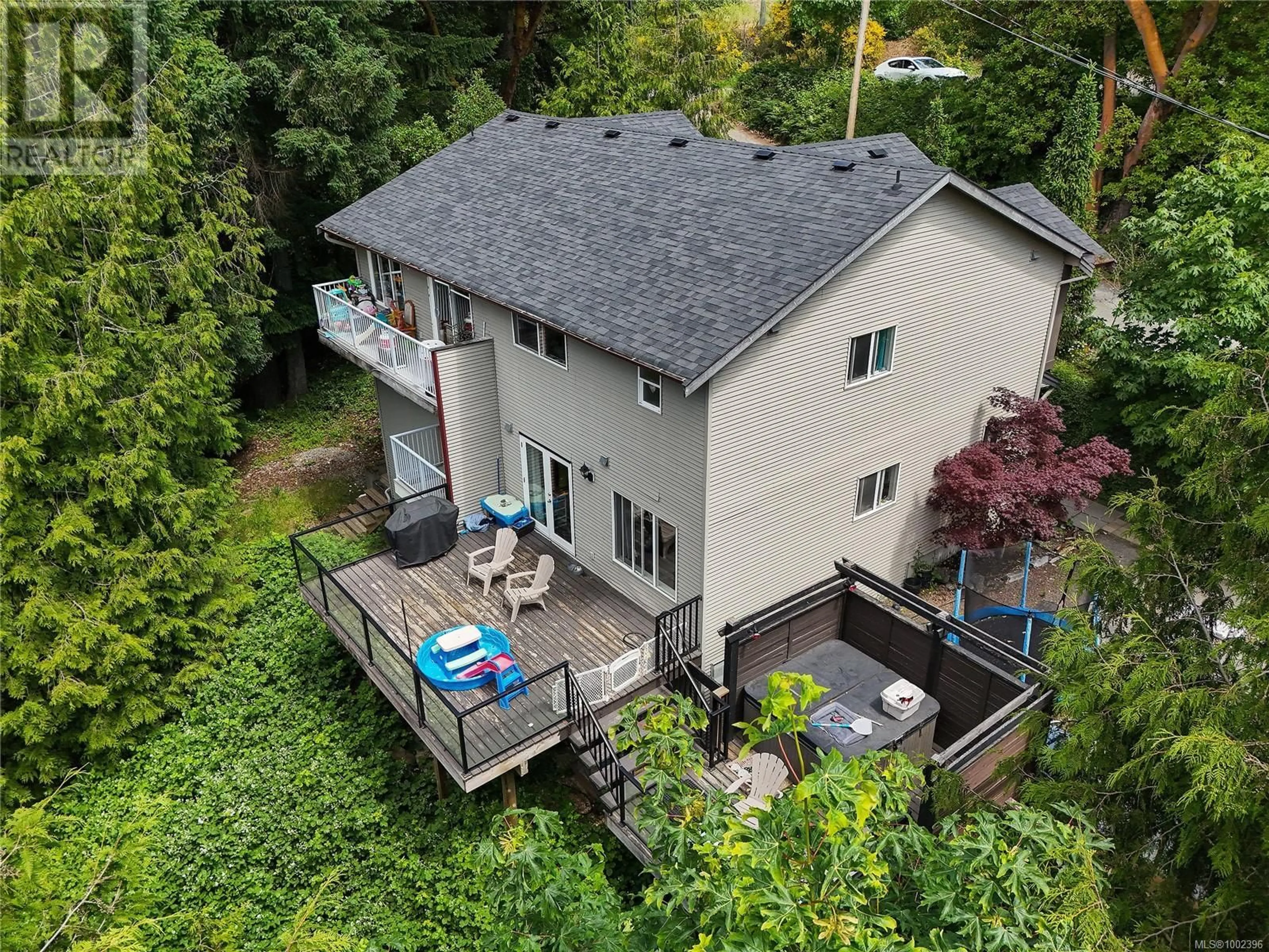 A pic from outside/outdoor area/front of a property/back of a property/a pic from drone, unknown for A & B - 3232 LOLEDO PLACE, Langford British Columbia V9C3W6