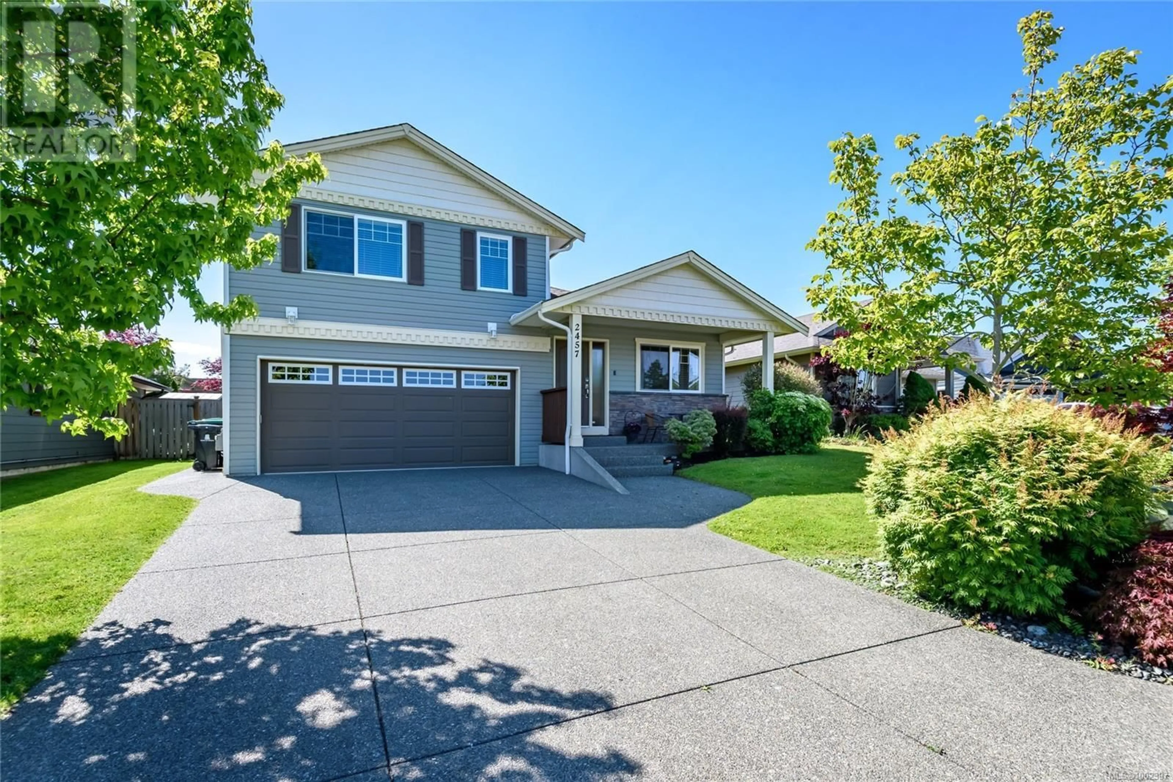 Home with vinyl exterior material, street for 2457 CANUCK PLACE, Comox British Columbia V9M0A2