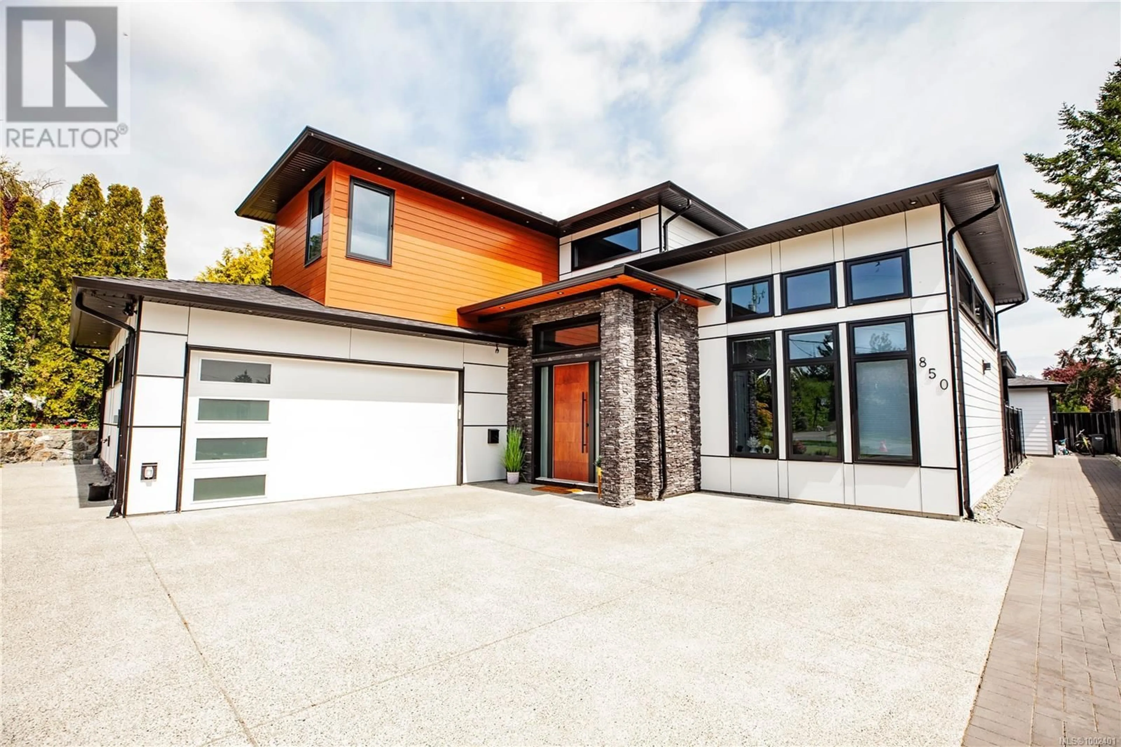 Home with brick exterior material, street for 850 SNOWDROP AVENUE, Saanich British Columbia V8Z2N4