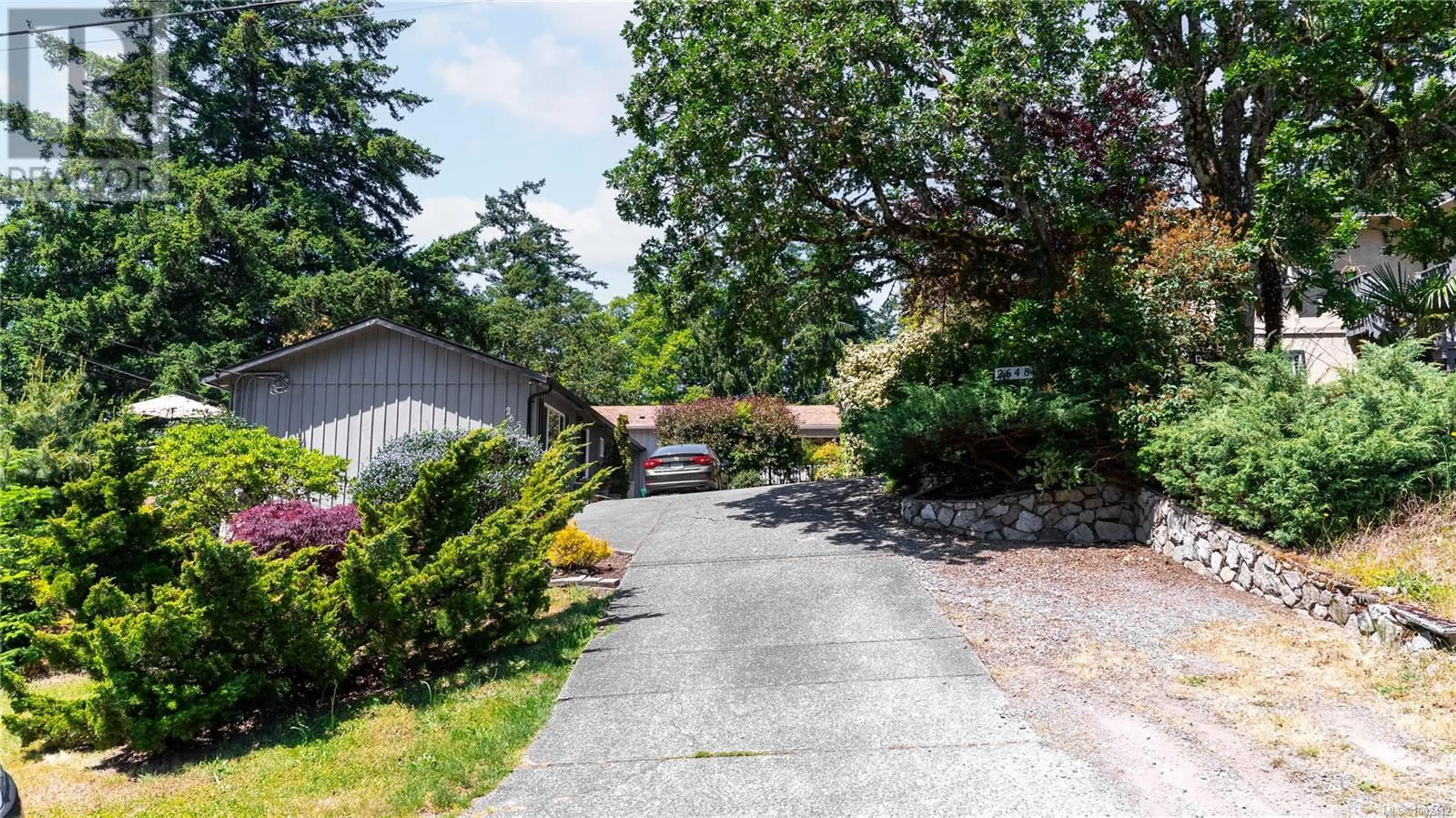 A pic from outside/outdoor area/front of a property/back of a property/a pic from drone, street for 2648 RAINVILLE ROAD, Langford British Columbia V9B3N1
