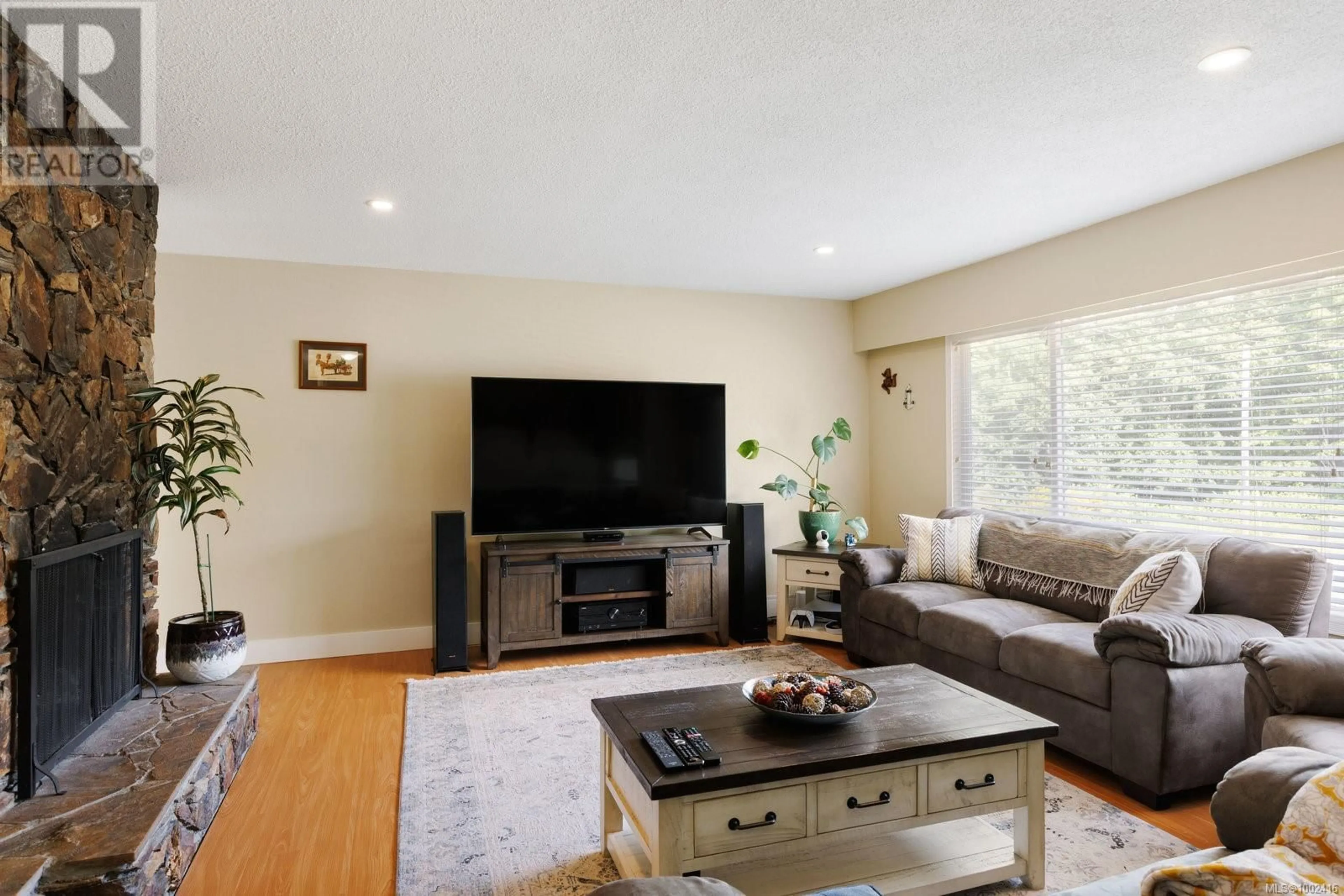 Living room with furniture, wood/laminate floor for 2867 SOOKE LAKE ROAD, Langford British Columbia V9B4R1