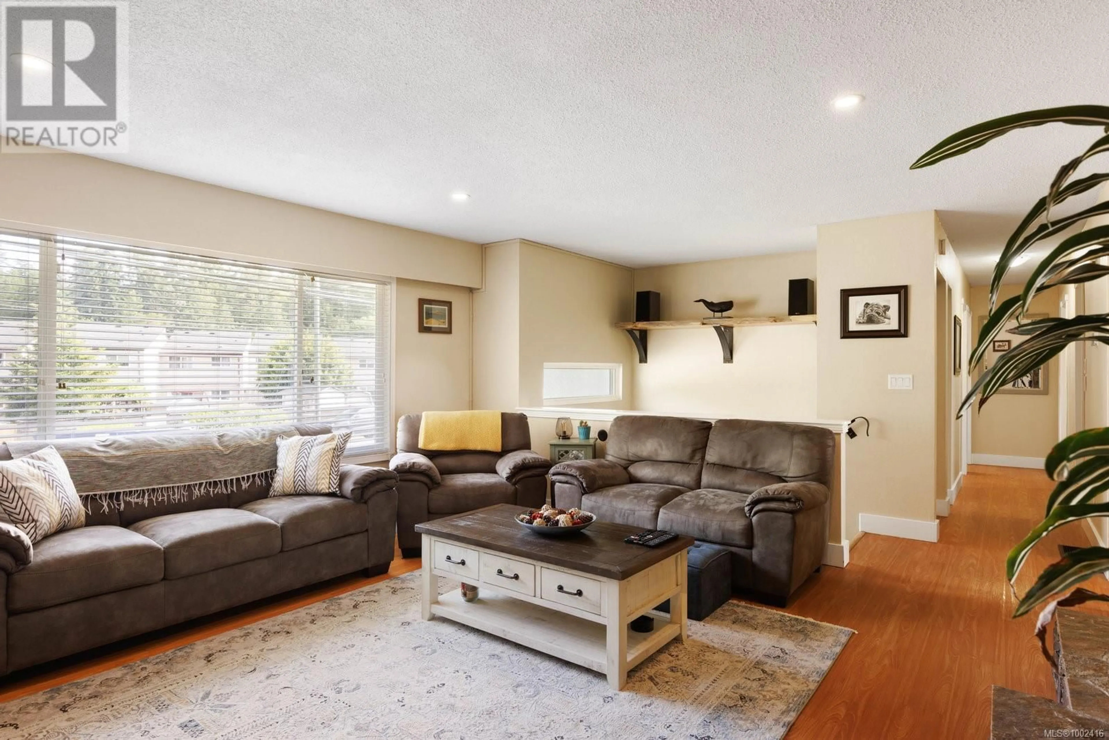 Living room with furniture, wood/laminate floor for 2867 SOOKE LAKE ROAD, Langford British Columbia V9B4R1