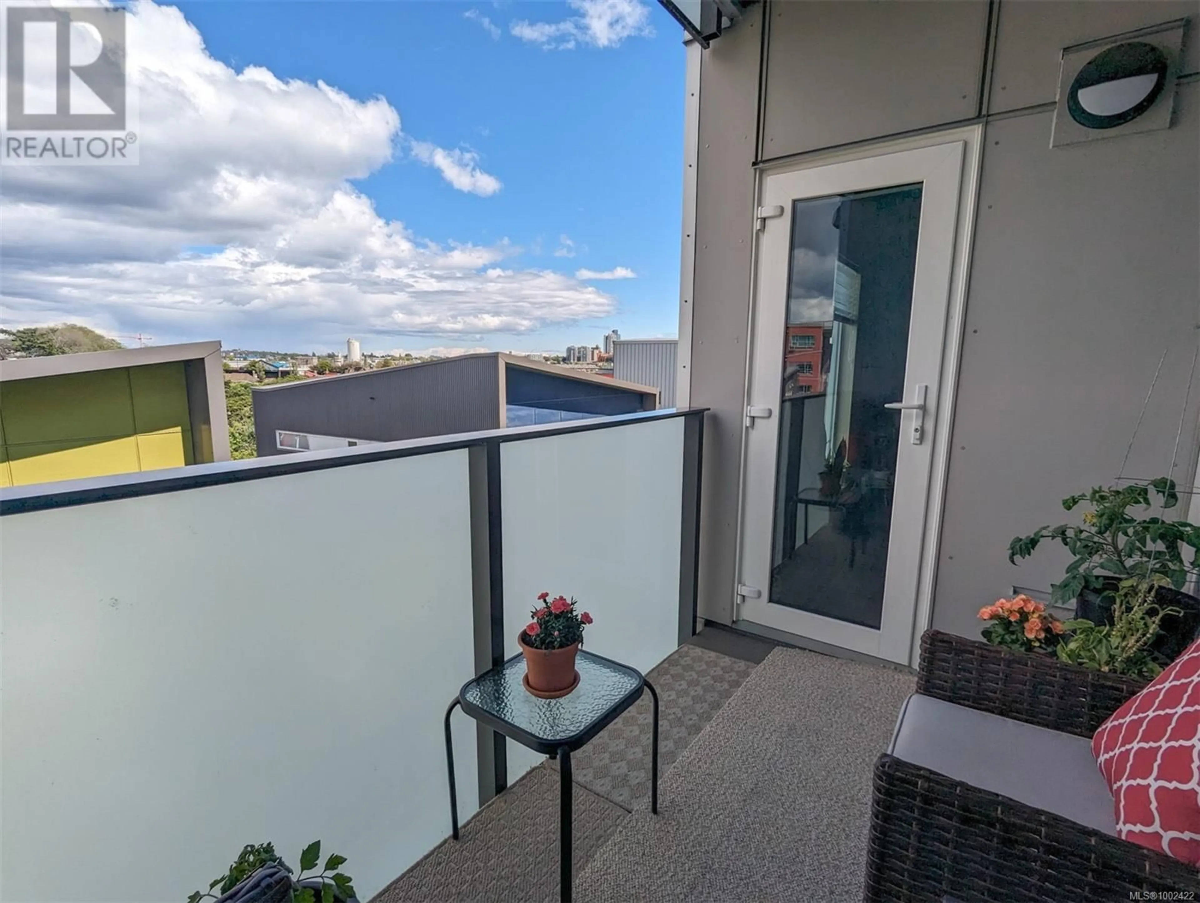Balcony in the apartment, city buildings view from balcony for 414 - 767 TYEE ROAD, Victoria British Columbia V9A0G5