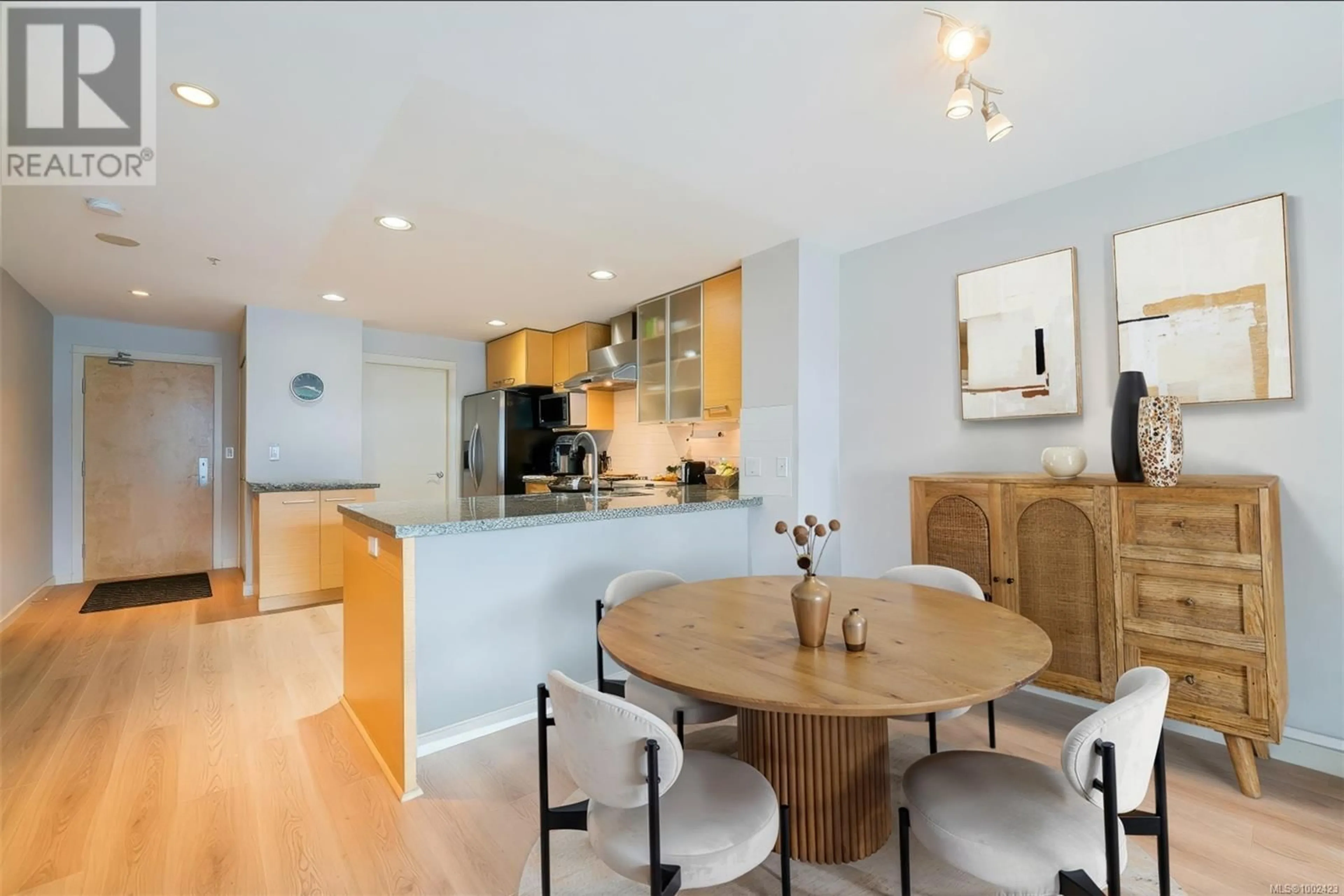 Open concept kitchen, wood/laminate floor for 208 - 38 FRONT STREET, Nanaimo British Columbia V9R0B8