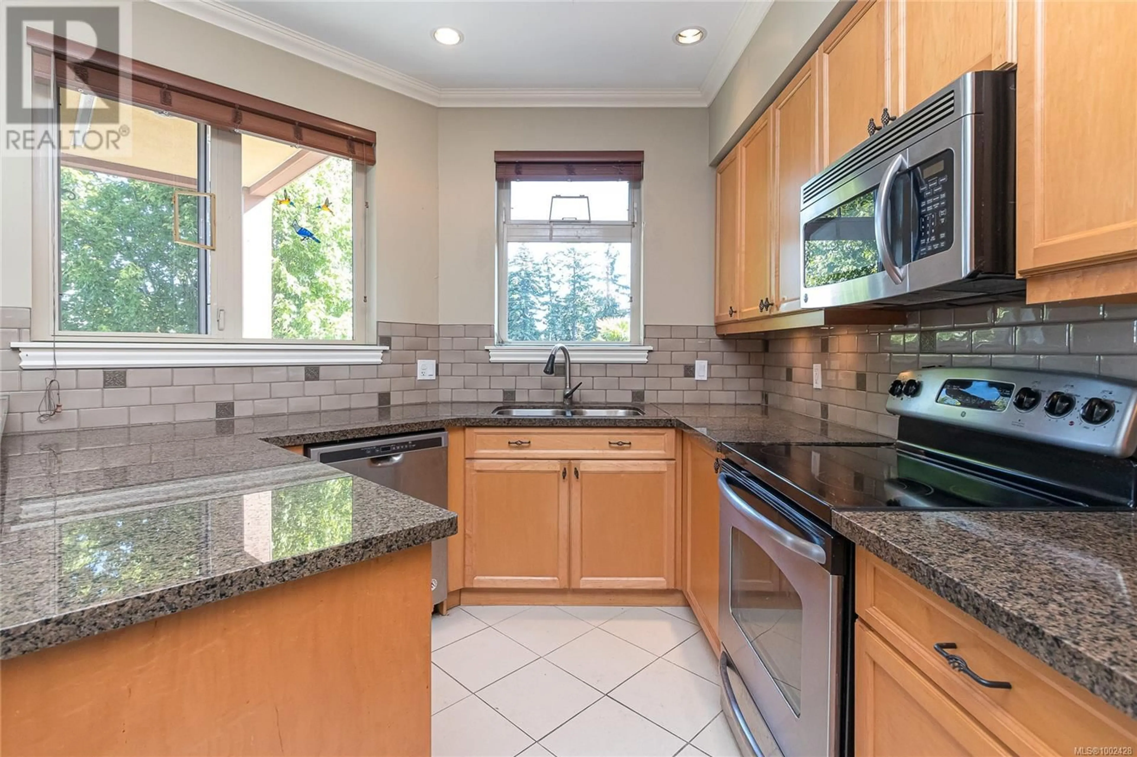 Standard kitchen, ceramic/tile floor for 206 - 755 GOLDSTREAM AVENUE, Langford British Columbia V9B2X4