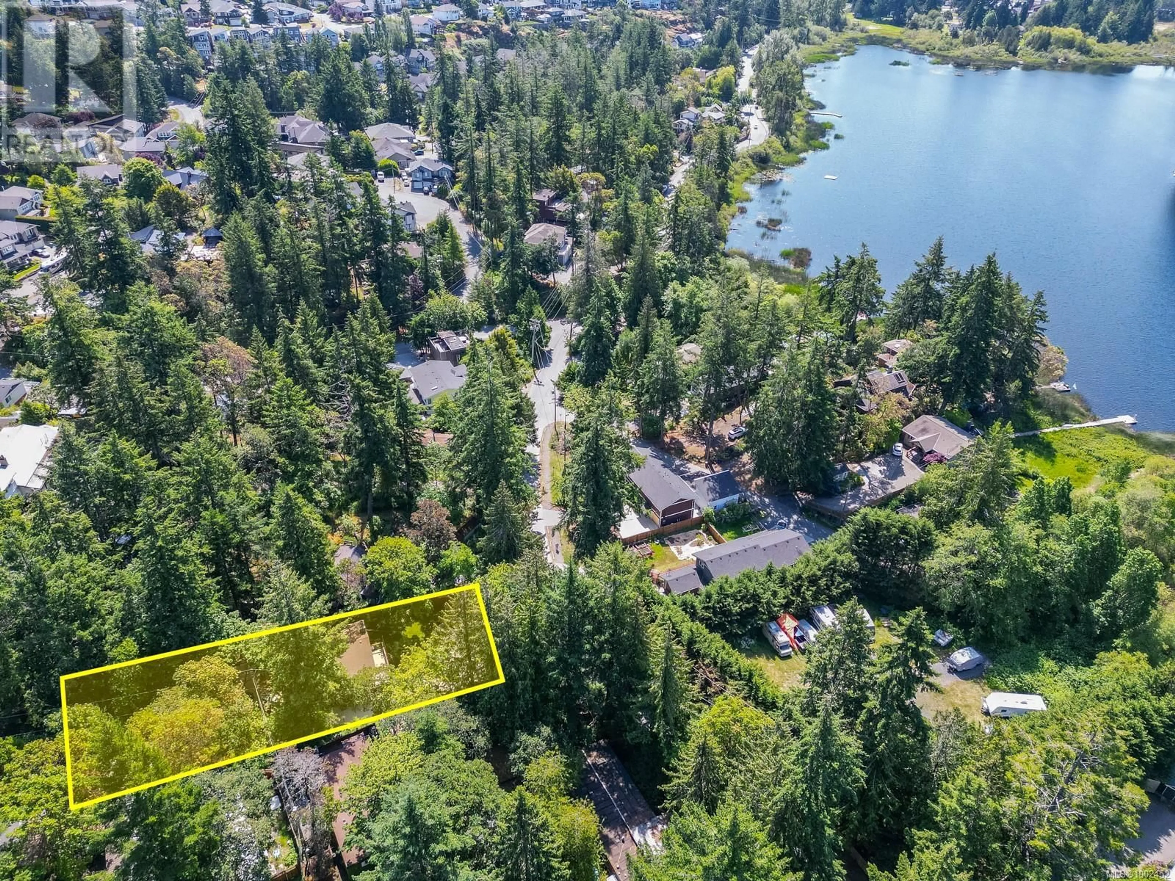 A pic from outside/outdoor area/front of a property/back of a property/a pic from drone, water/lake/river/ocean view for 2503 FLORENCE LAKE ROAD, Langford British Columbia V9B4H3