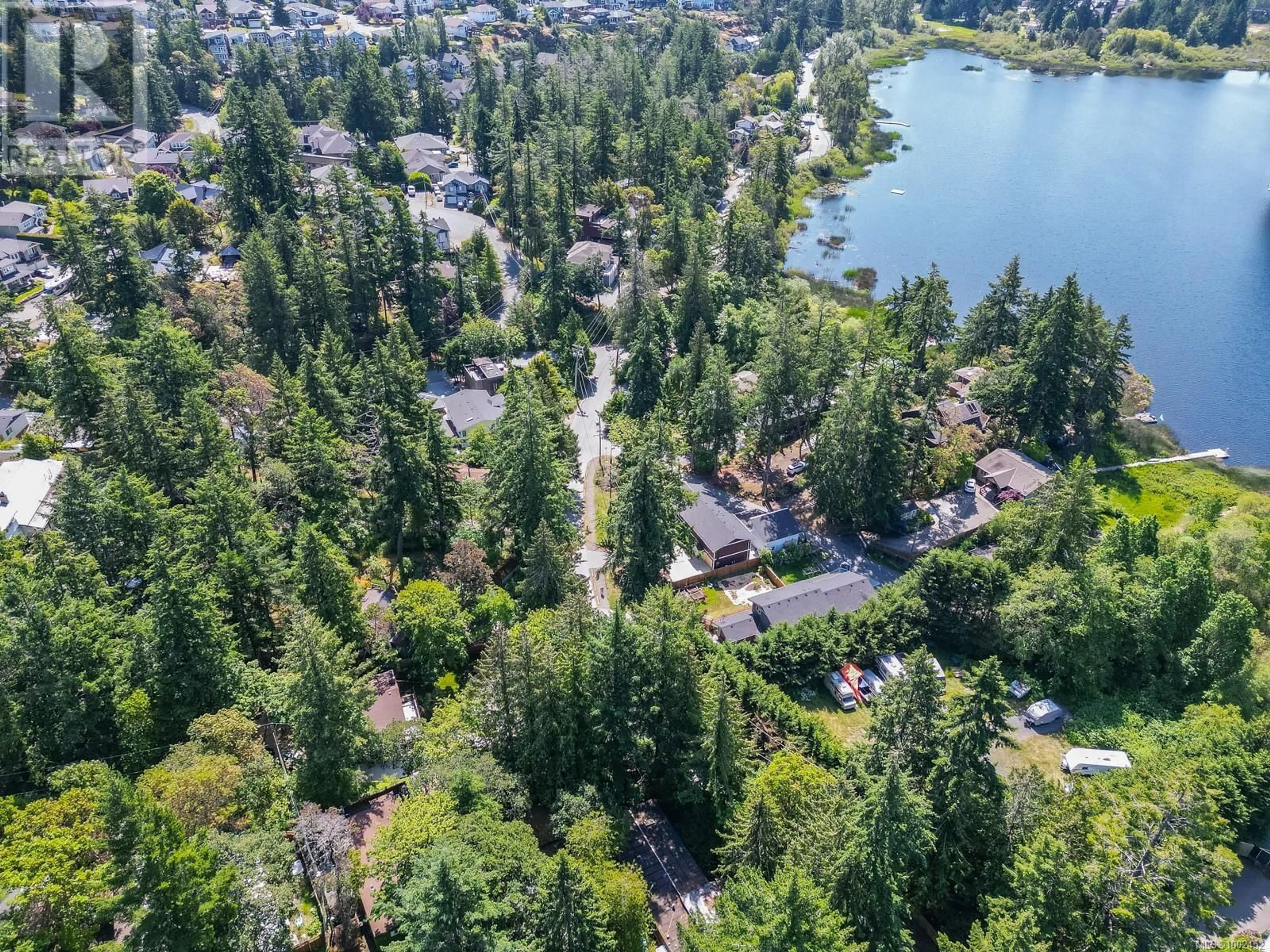 A pic from outside/outdoor area/front of a property/back of a property/a pic from drone, water/lake/river/ocean view for 2503 FLORENCE LAKE ROAD, Langford British Columbia V9B4H3
