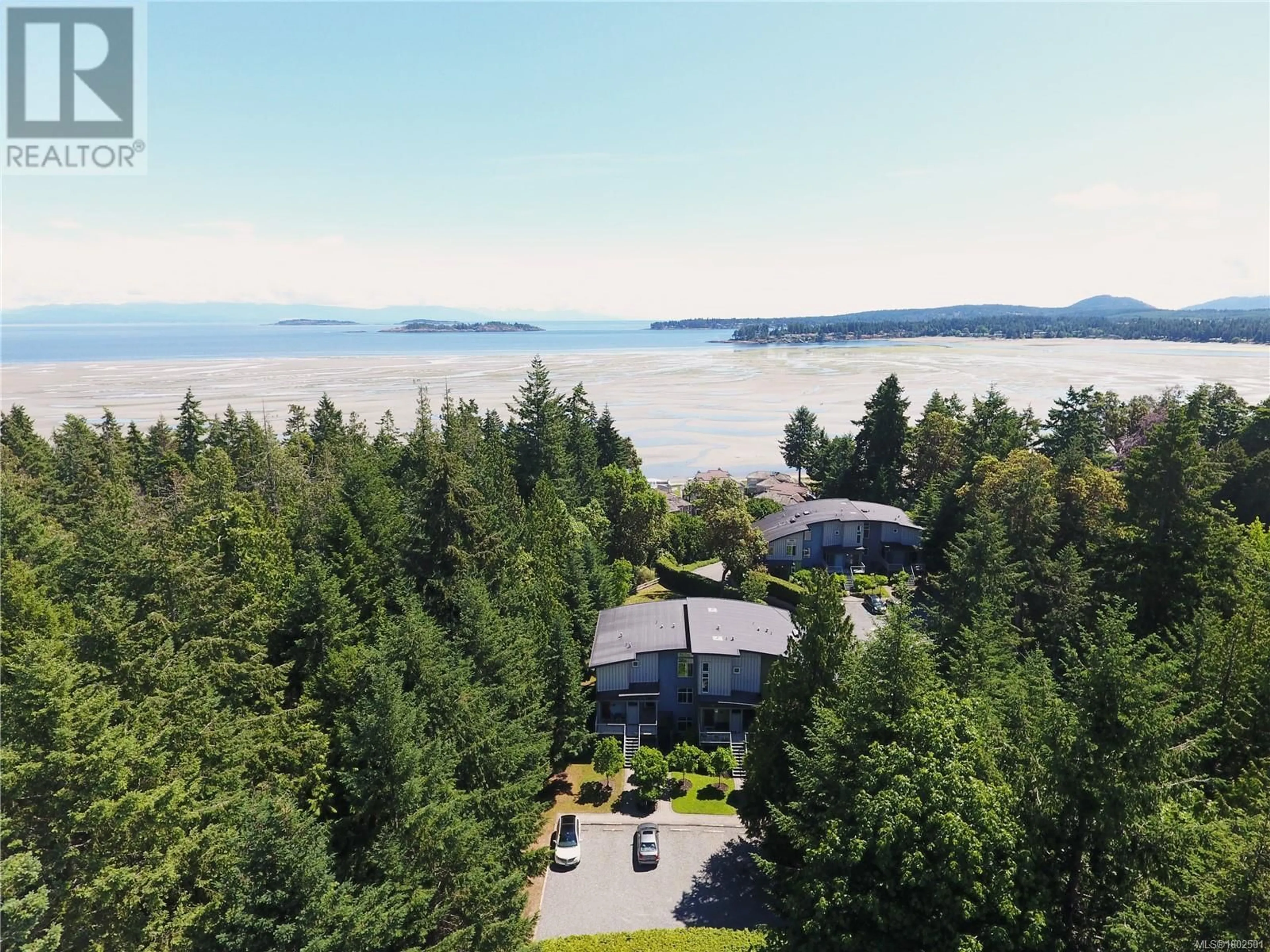 A pic from outside/outdoor area/front of a property/back of a property/a pic from drone, water/lake/river/ocean view for 32 - 1059 TANGLEWOOD PLACE, Parksville British Columbia V9P2E2