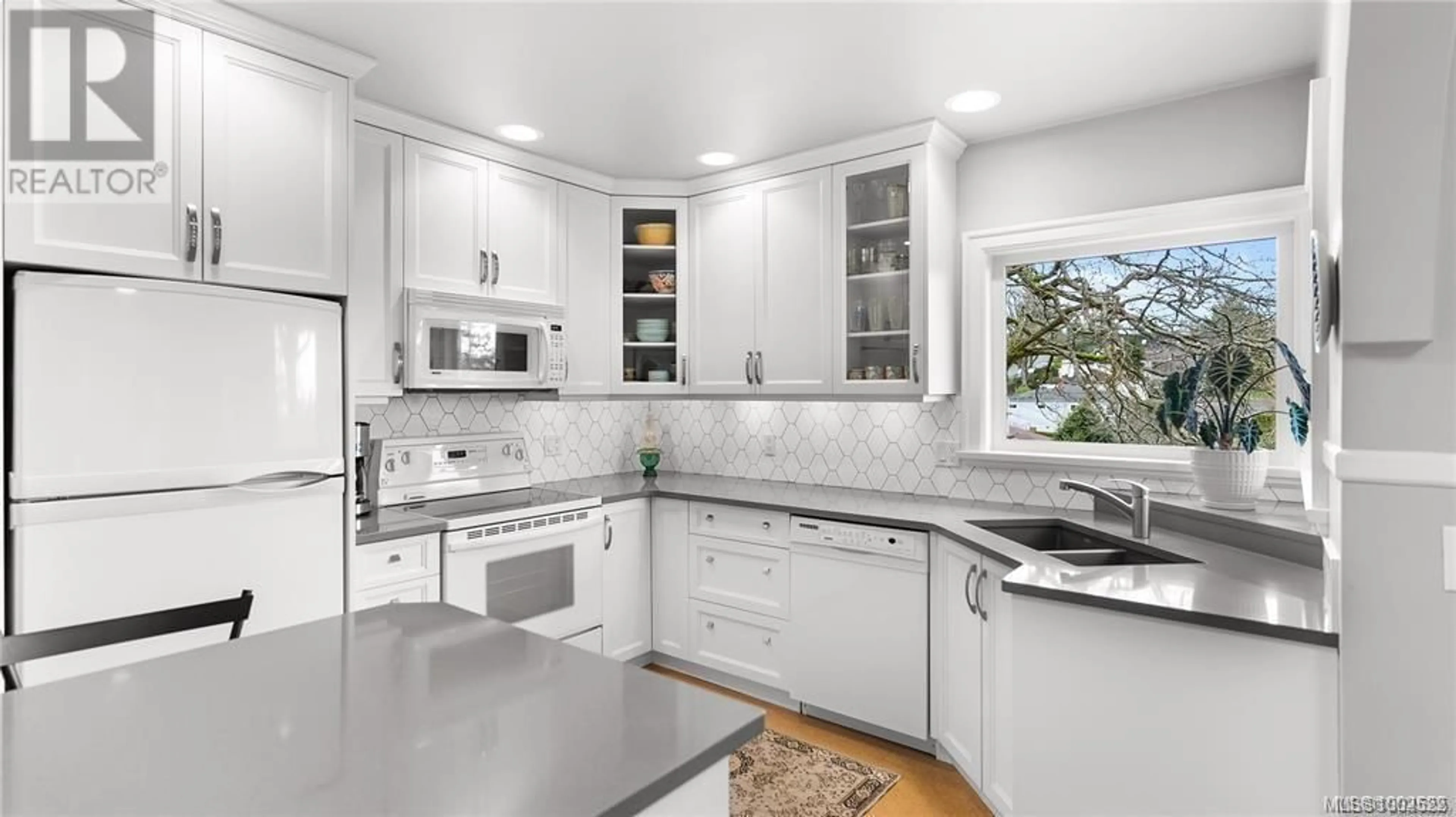 Open concept kitchen, ceramic/tile floor for 3358 COOK STREET, Saanich British Columbia V8X1A8
