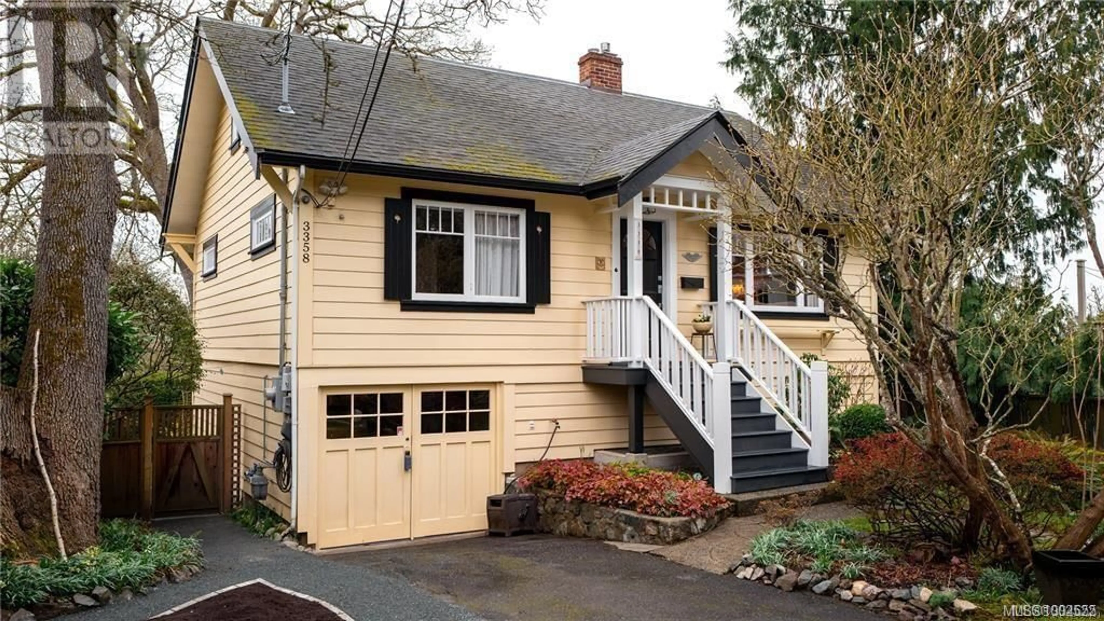 Home with vinyl exterior material, street for 3358 COOK STREET, Saanich British Columbia V8X1A8