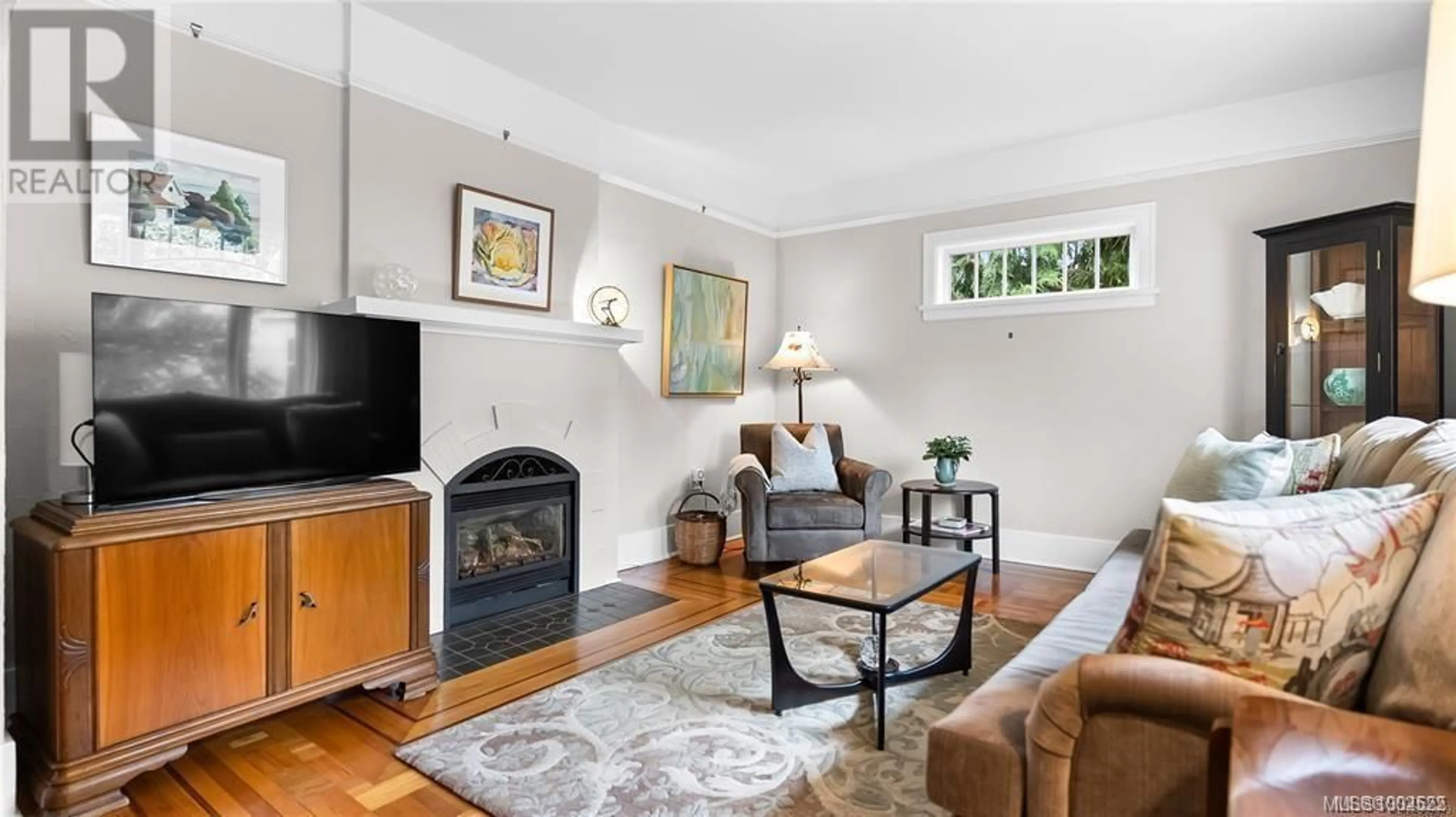 Living room with furniture, unknown for 3358 COOK STREET, Saanich British Columbia V8X1A8