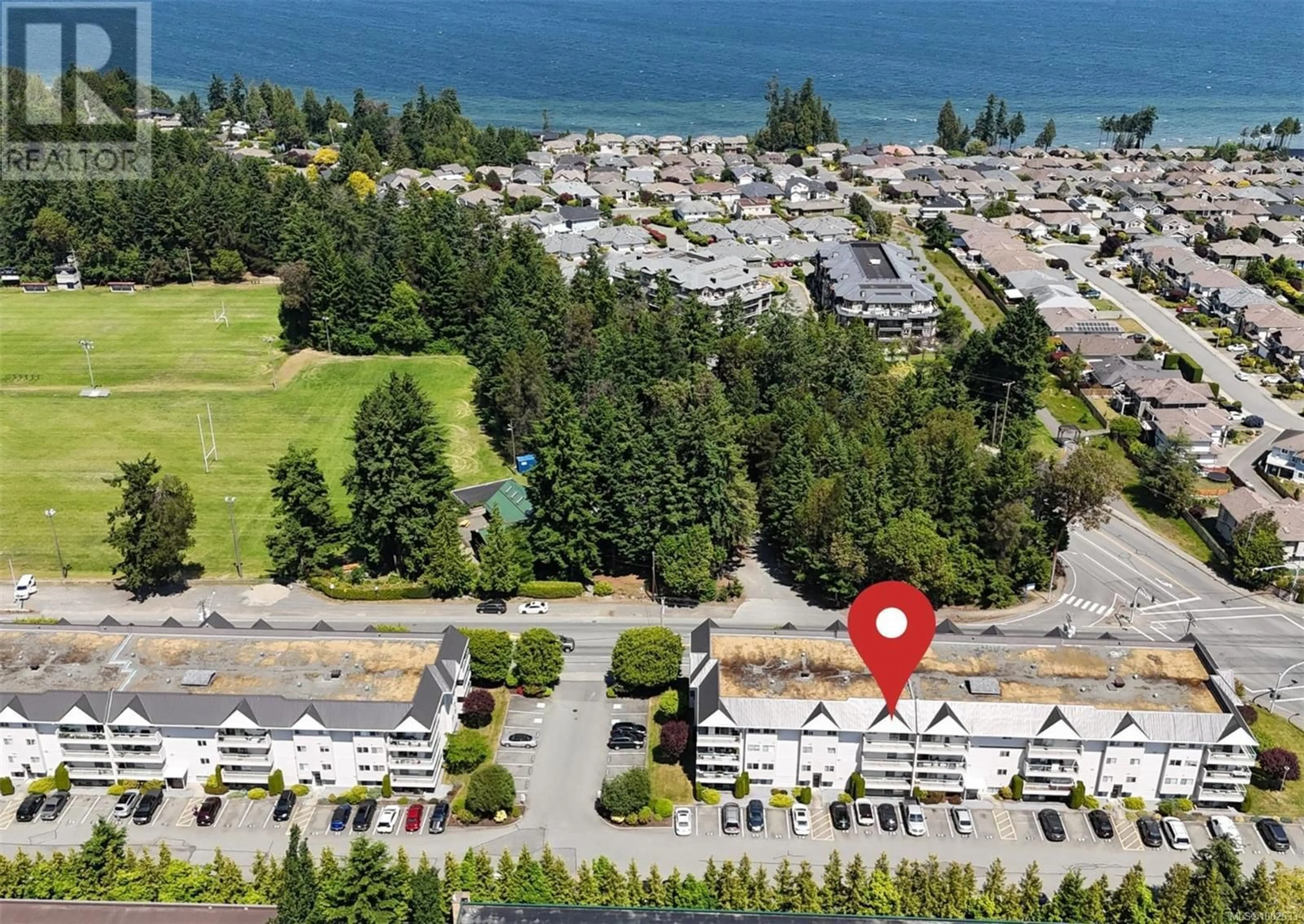 A pic from outside/outdoor area/front of a property/back of a property/a pic from drone, water/lake/river/ocean view for 424 - 6711 DOVER ROAD, Nanaimo British Columbia V9V1L9