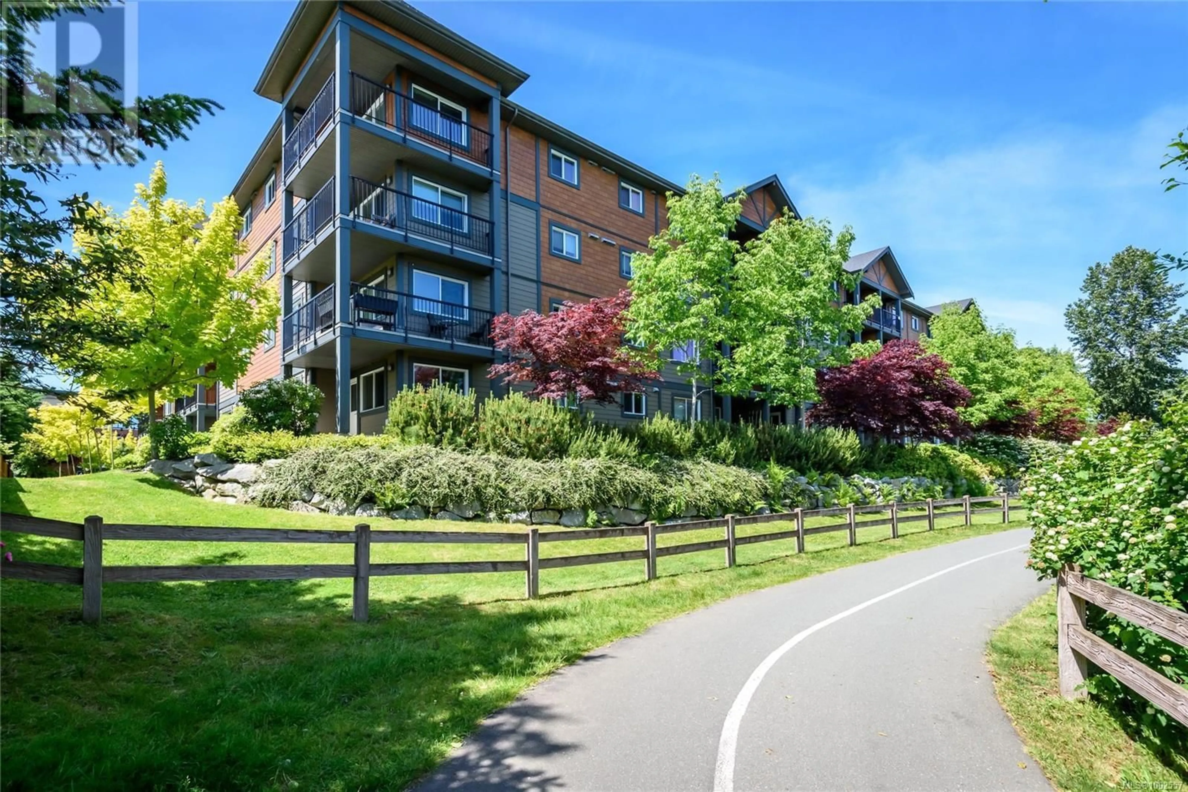 A pic from outside/outdoor area/front of a property/back of a property/a pic from drone, water/lake/river/ocean view for 401 - 1944 RIVERSIDE LANE, Courtenay British Columbia V9N0E5