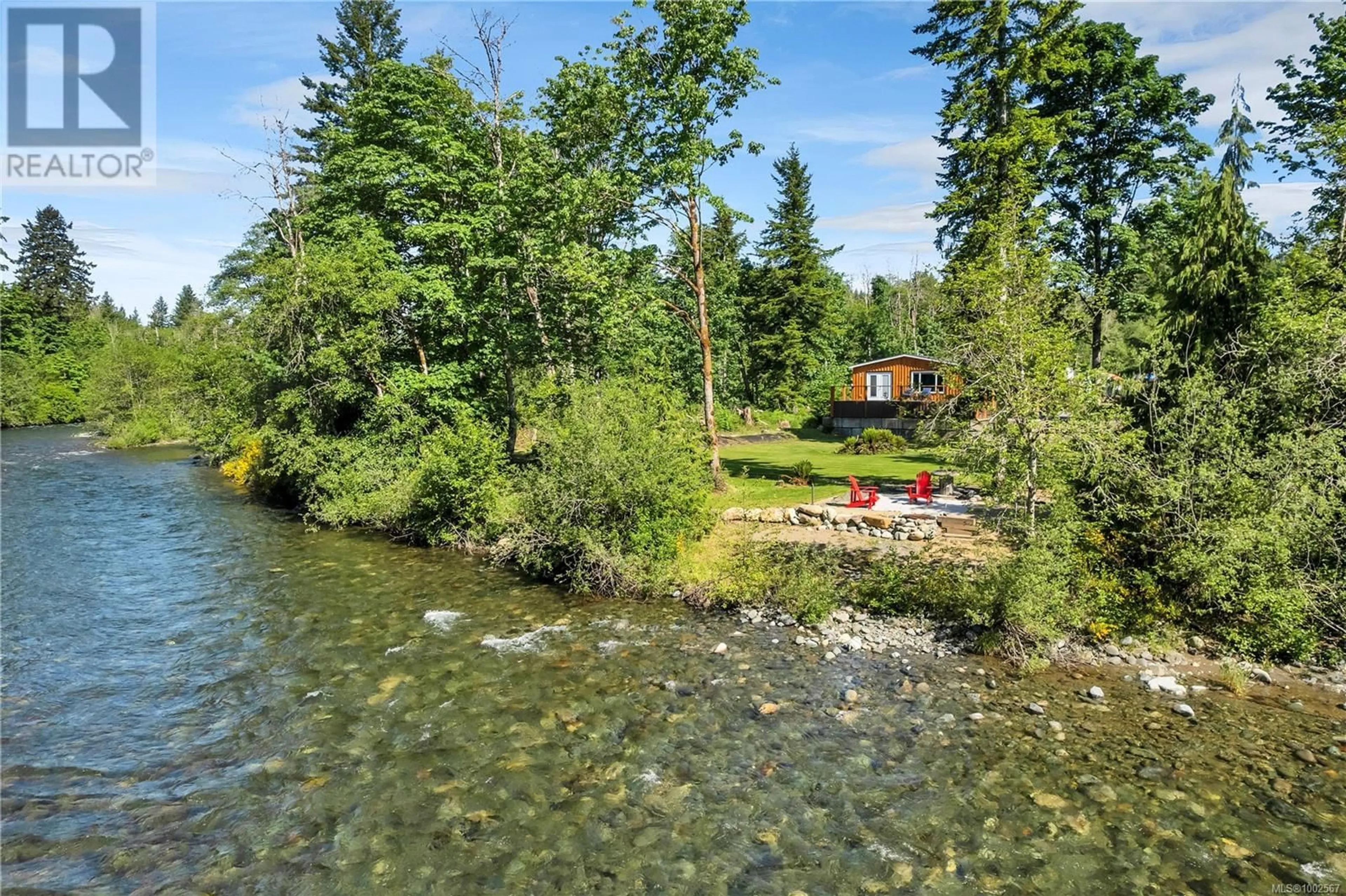 A pic from outside/outdoor area/front of a property/back of a property/a pic from drone, water/lake/river/ocean view for 3785 WOODHUS ROAD, Campbell River British Columbia V9H1B3