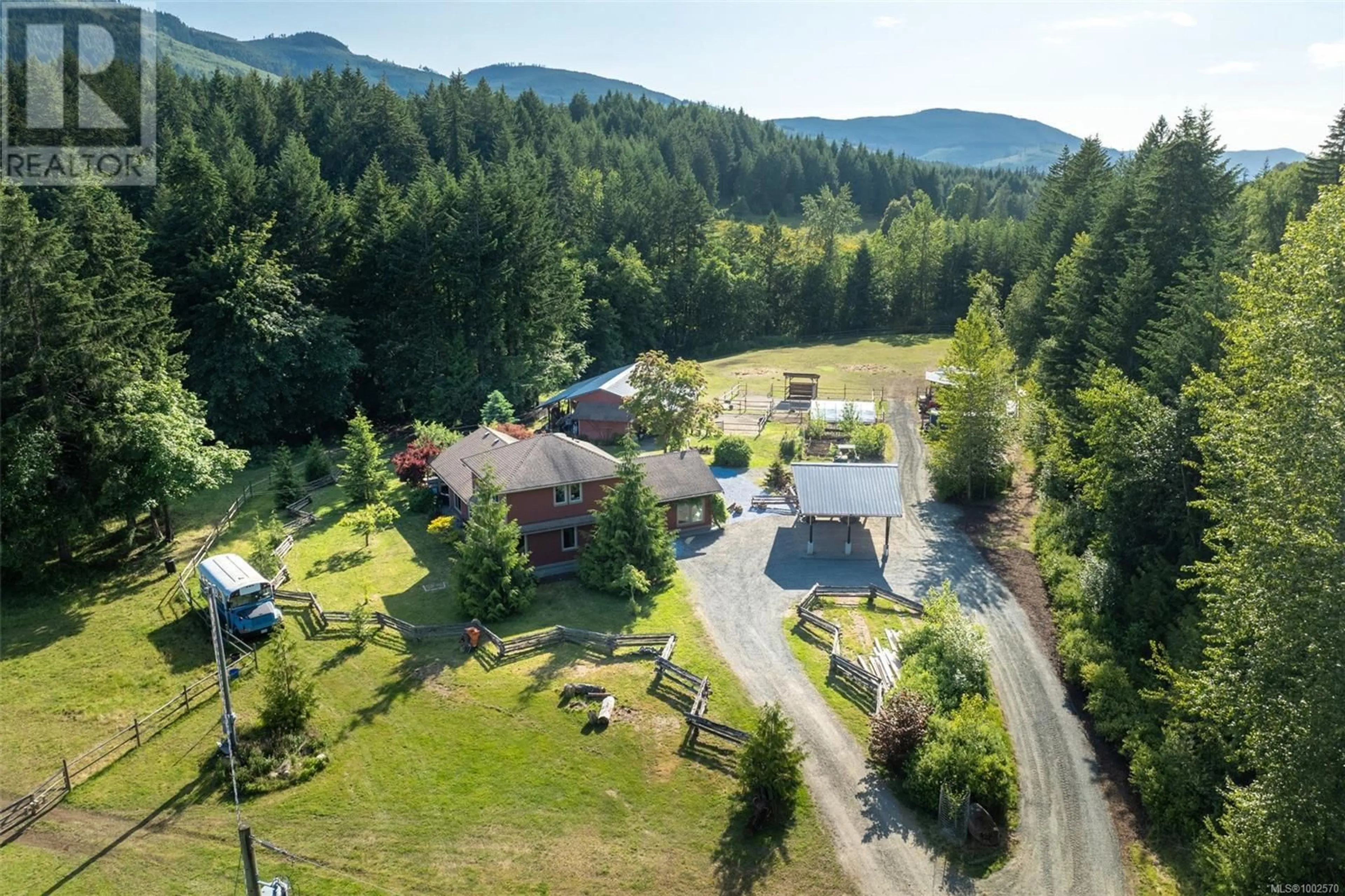 A pic from outside/outdoor area/front of a property/back of a property/a pic from drone, mountain view for 3700 HANKINS ROAD, Duncan British Columbia V9L6T2