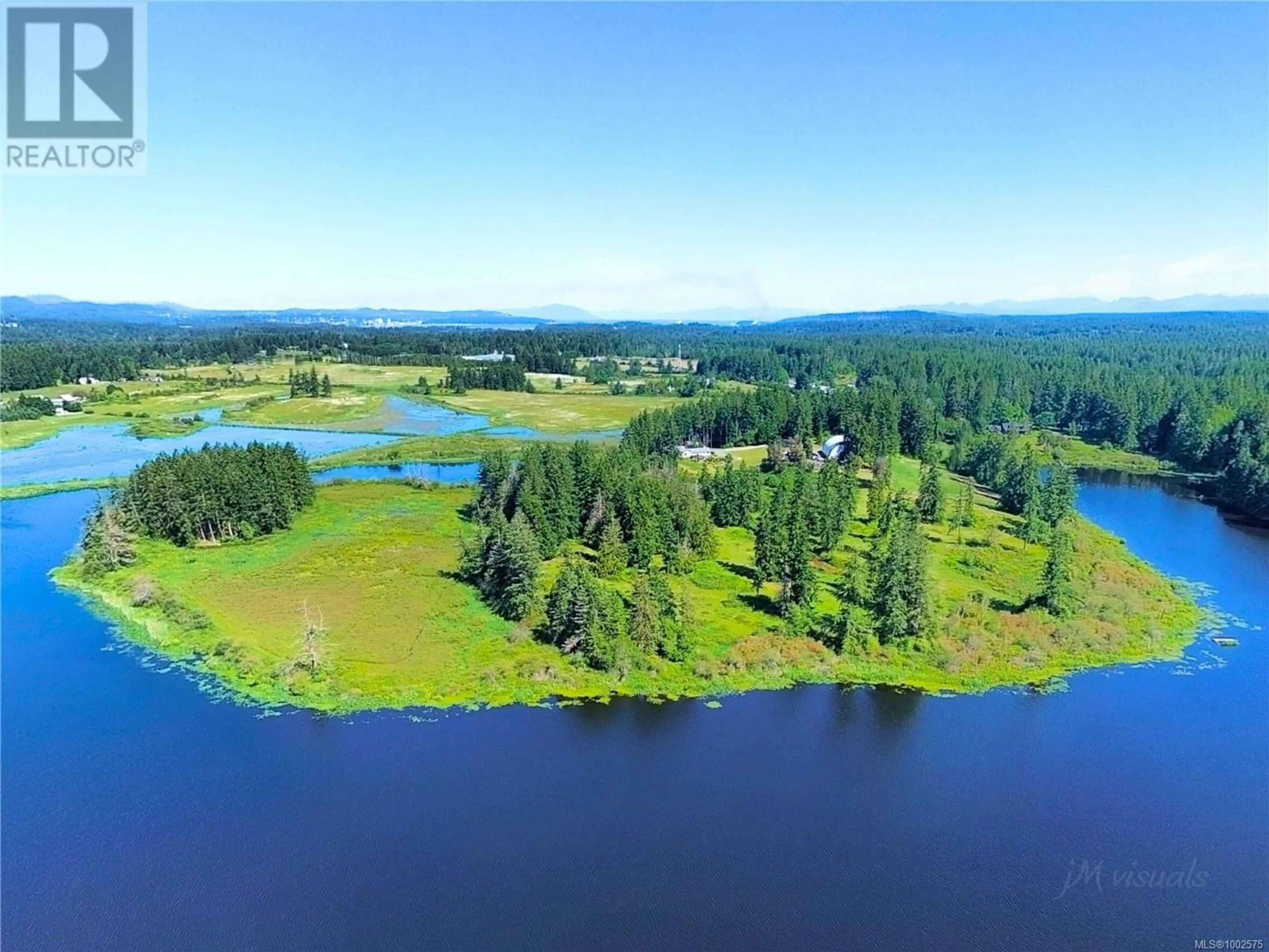 A pic from outside/outdoor area/front of a property/back of a property/a pic from drone, water/lake/river/ocean view for 2551 BRAUN ROAD, Nanaimo British Columbia V9X1W5