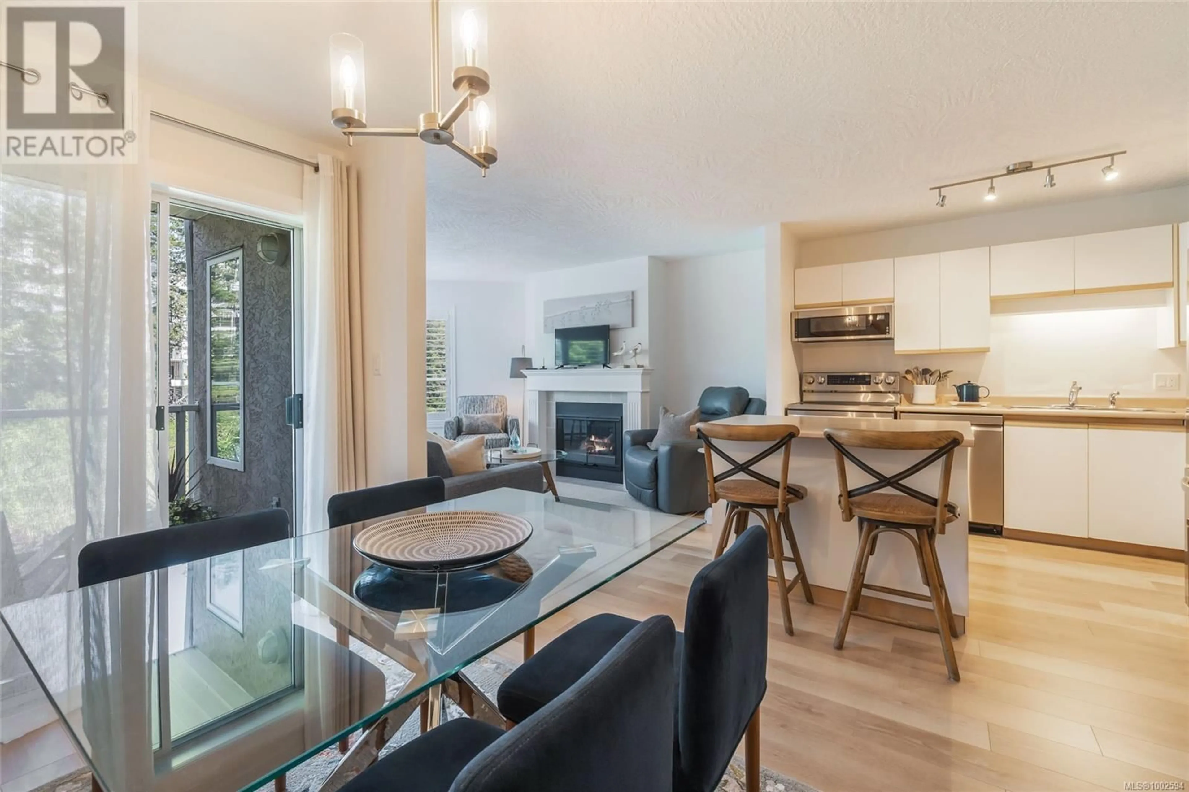 Open concept kitchen, wood/laminate floor for 314 - 4969 WILLS ROAD, Nanaimo British Columbia V9T2K4