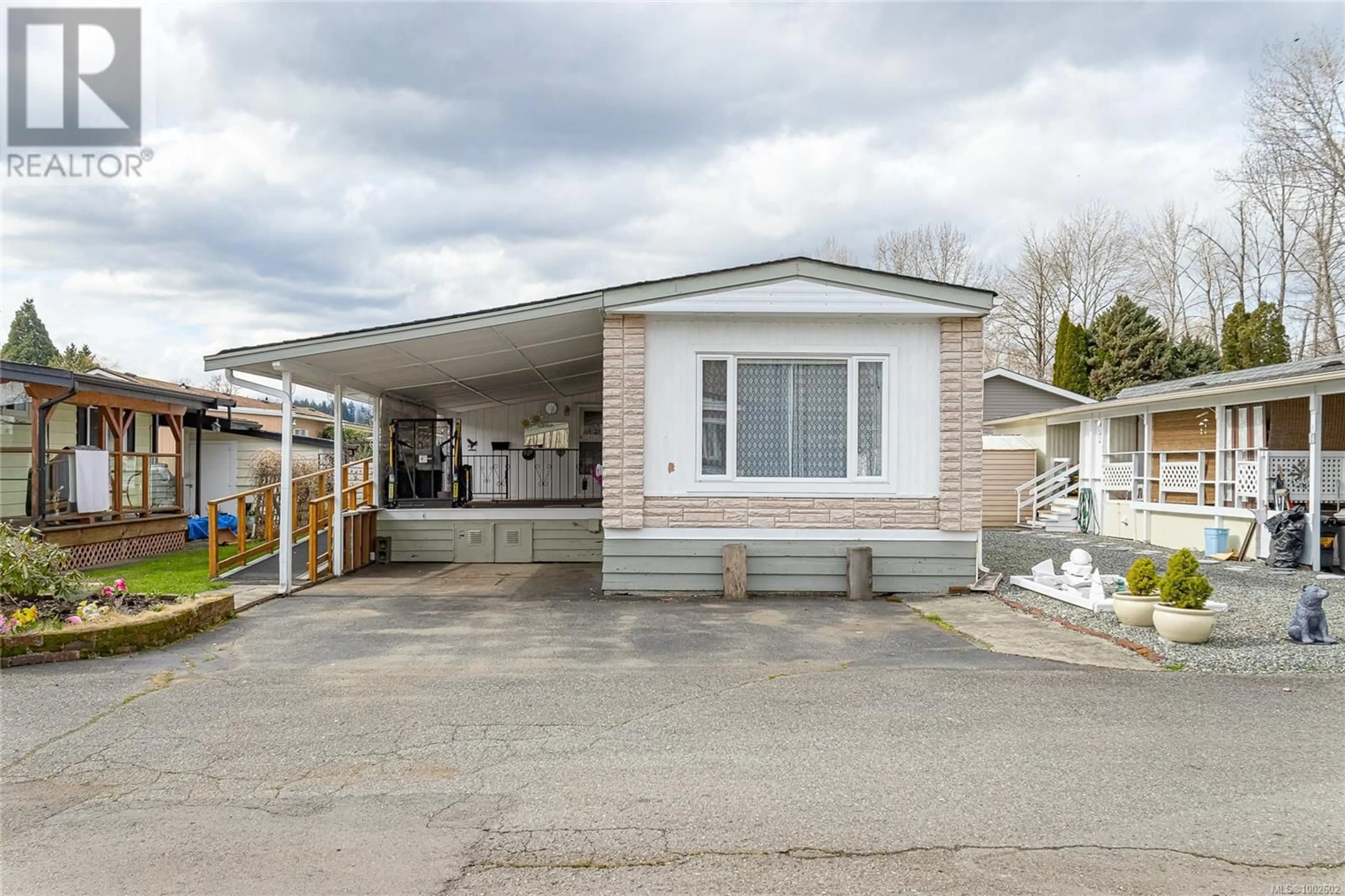 Home with vinyl exterior material, street for 916 - 2885 BOYS ROAD, Duncan British Columbia V9L4Y9