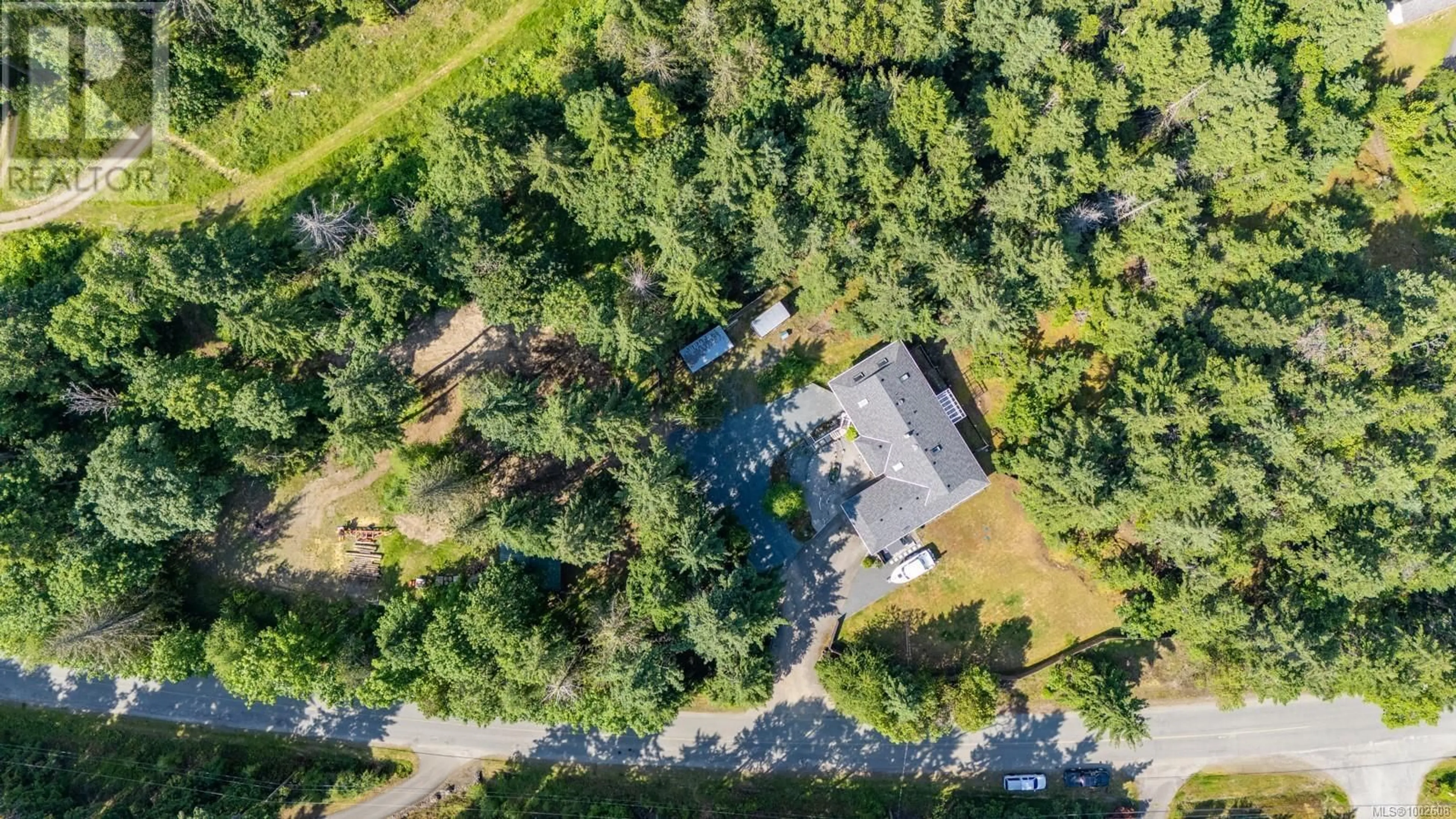 A pic from outside/outdoor area/front of a property/back of a property/a pic from drone, forest/trees view for 1935 MORELLO ROAD, Nanoose Bay British Columbia V9P9B1