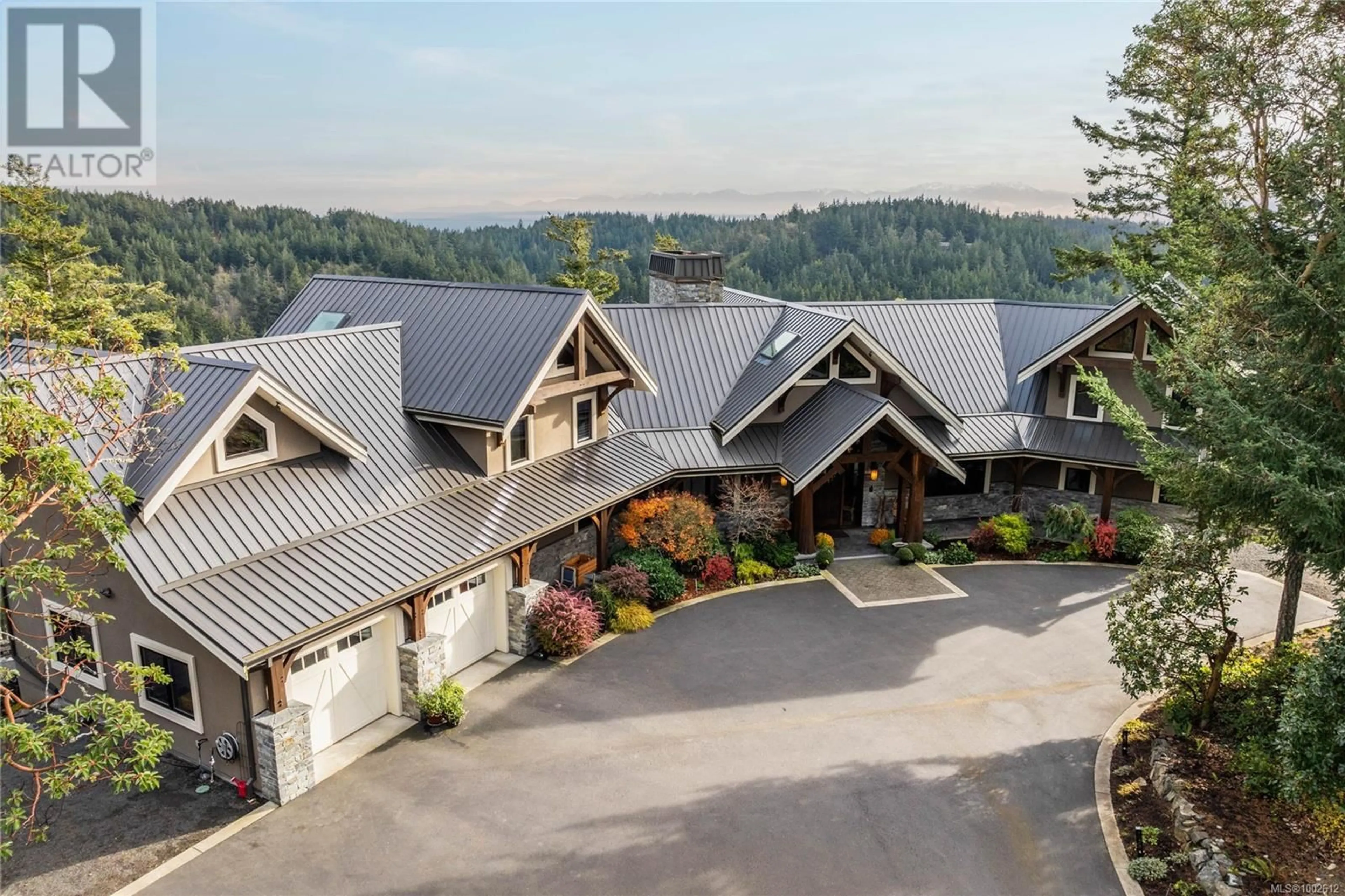 A pic from outside/outdoor area/front of a property/back of a property/a pic from drone, mountain view for 4809 EALES ROAD, Metchosin British Columbia V9C4E1