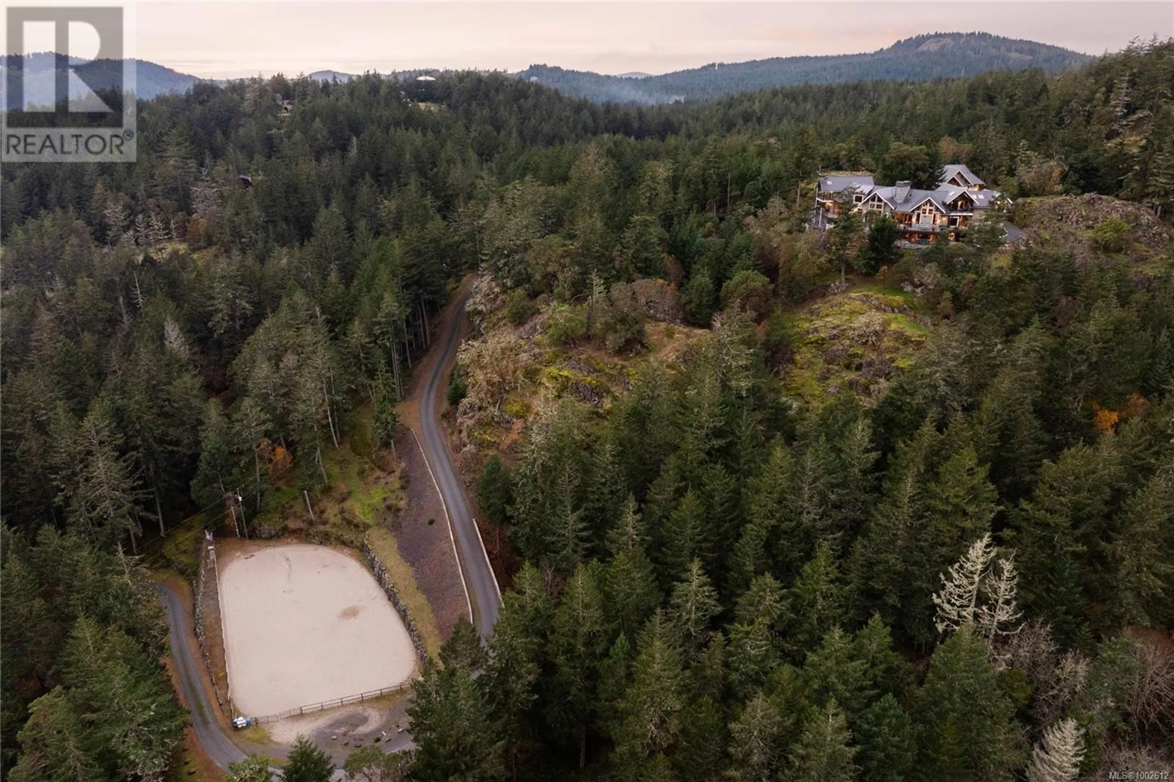 A pic from outside/outdoor area/front of a property/back of a property/a pic from drone, forest/trees view for 4809 EALES ROAD, Metchosin British Columbia V9C4E1