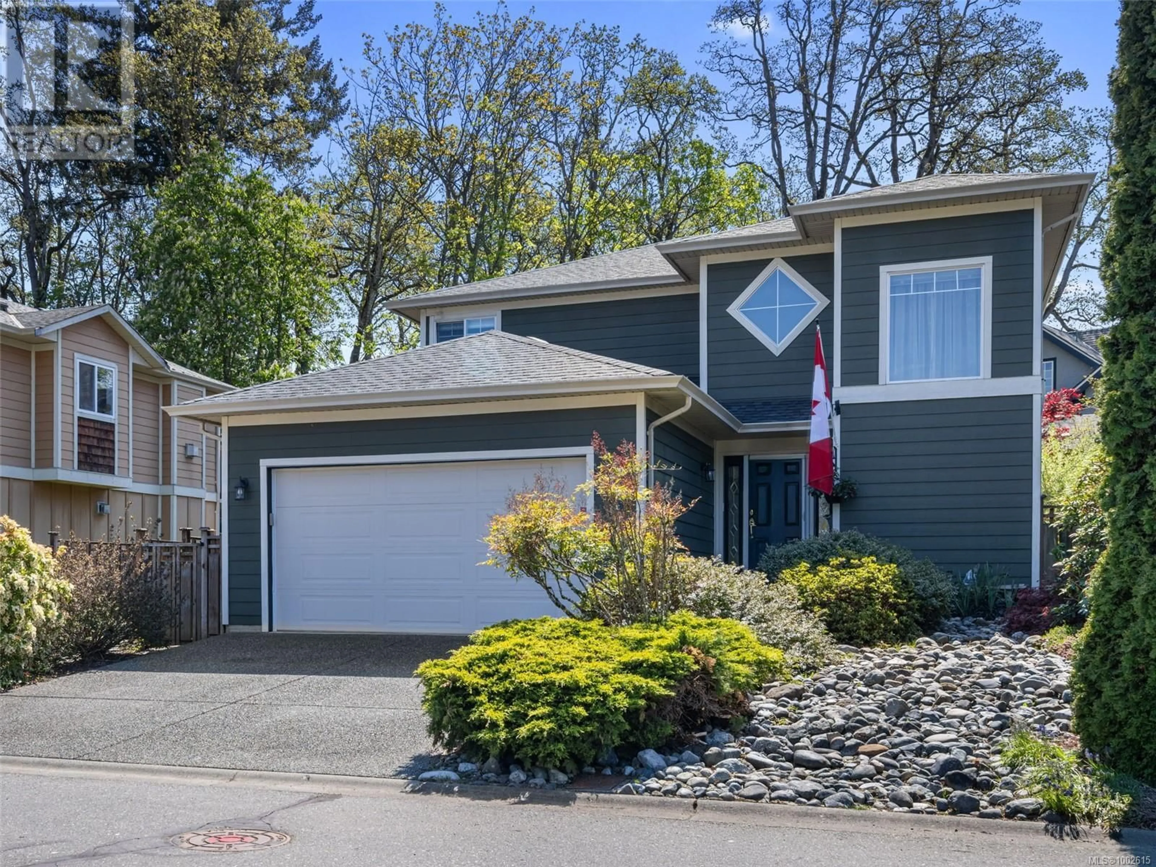 Home with vinyl exterior material, street for 4135 ROCKHOME GARDENS, Saanich British Columbia V8X5K4