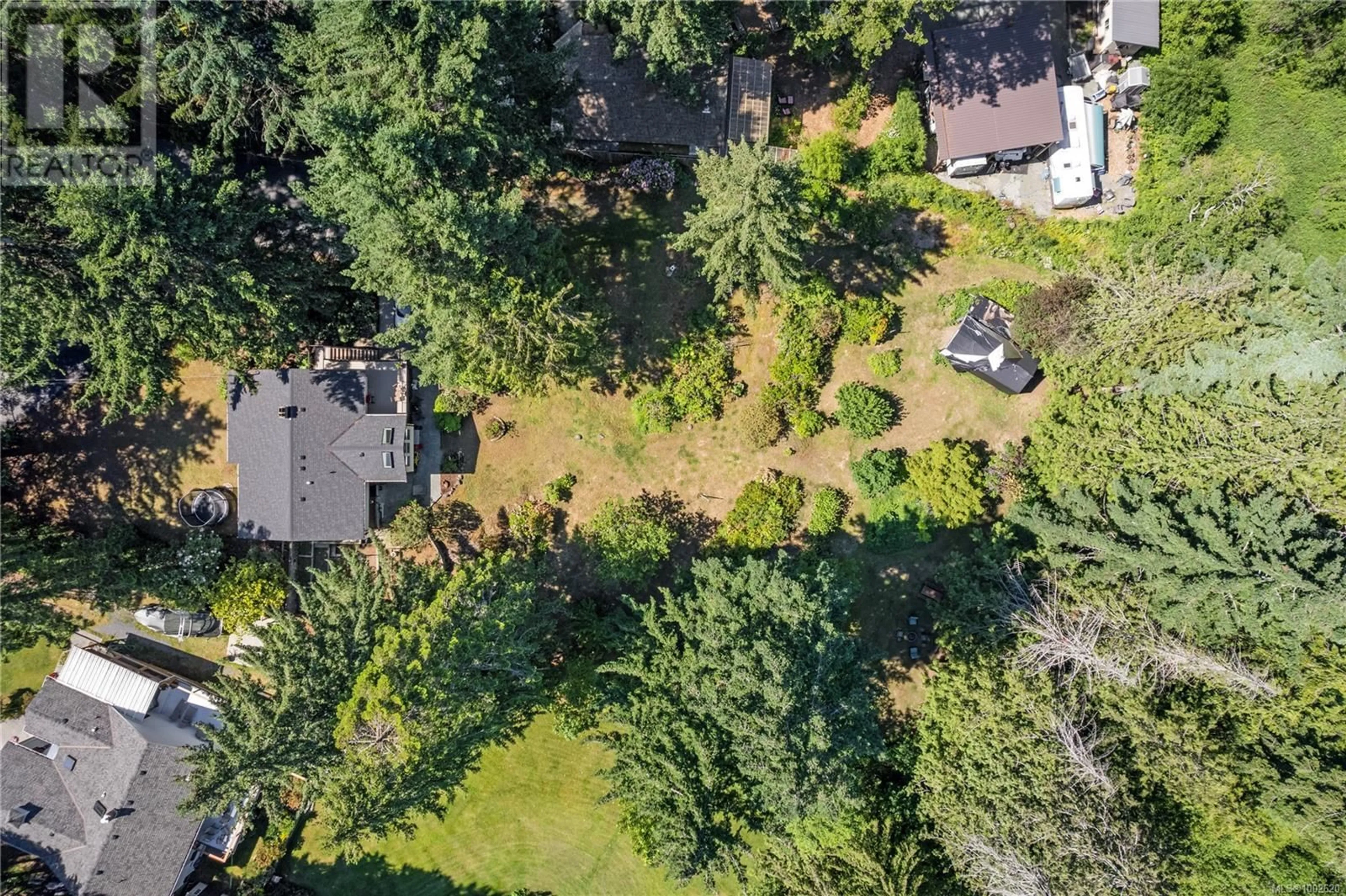 A pic from outside/outdoor area/front of a property/back of a property/a pic from drone, forest/trees view for 6650 GREEN ACRES WAY, Nanaimo British Columbia V9T5R9